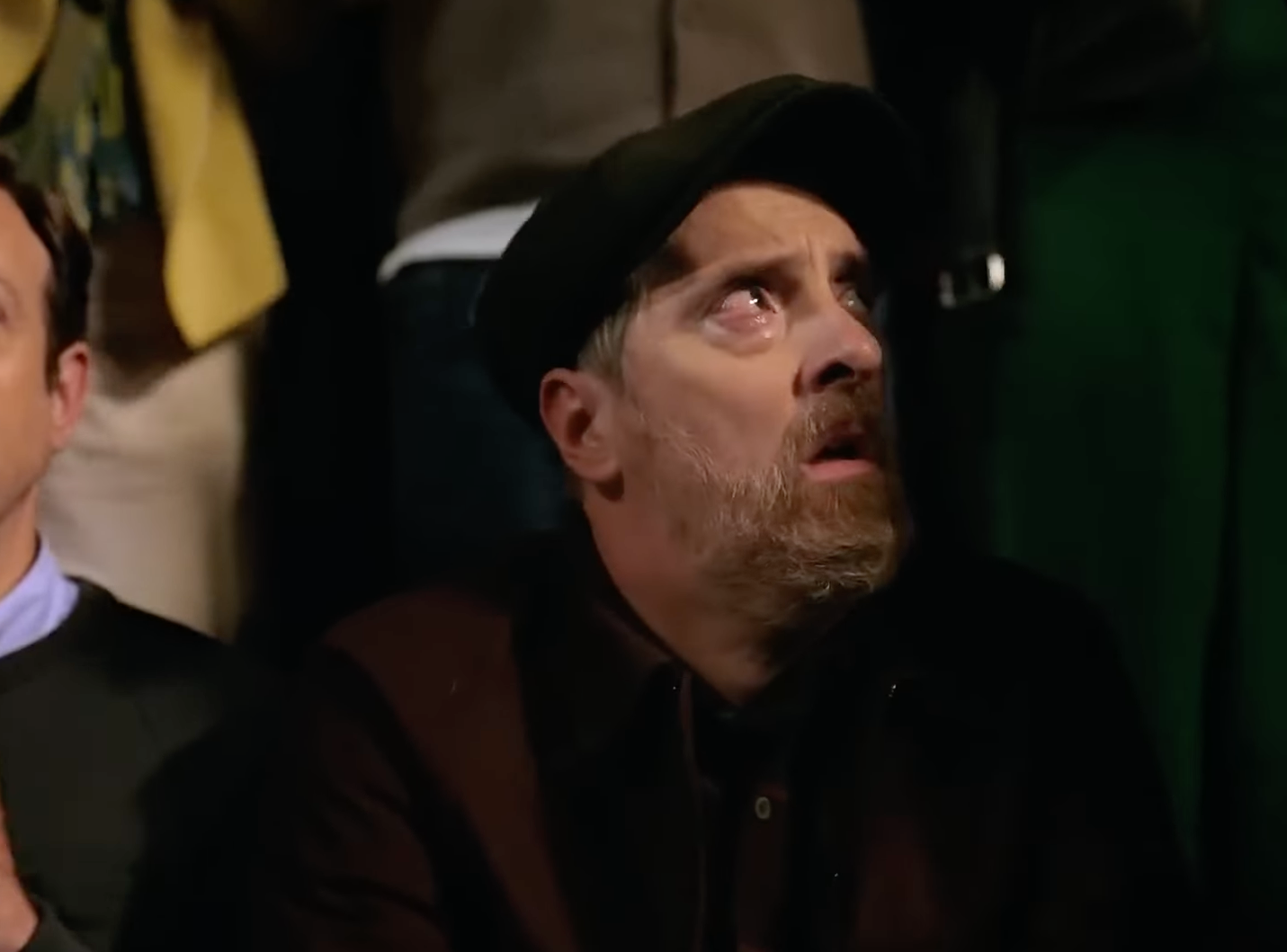 Coach Beard looking sad up at people.