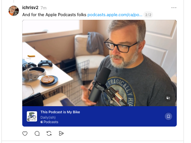A man with glasses is speaking into a microphone while sitting at a desk with headphones, a game controller, and a plate with a pastry, sharing a link to an Apple Podcast titled This Podcast is My Bike.