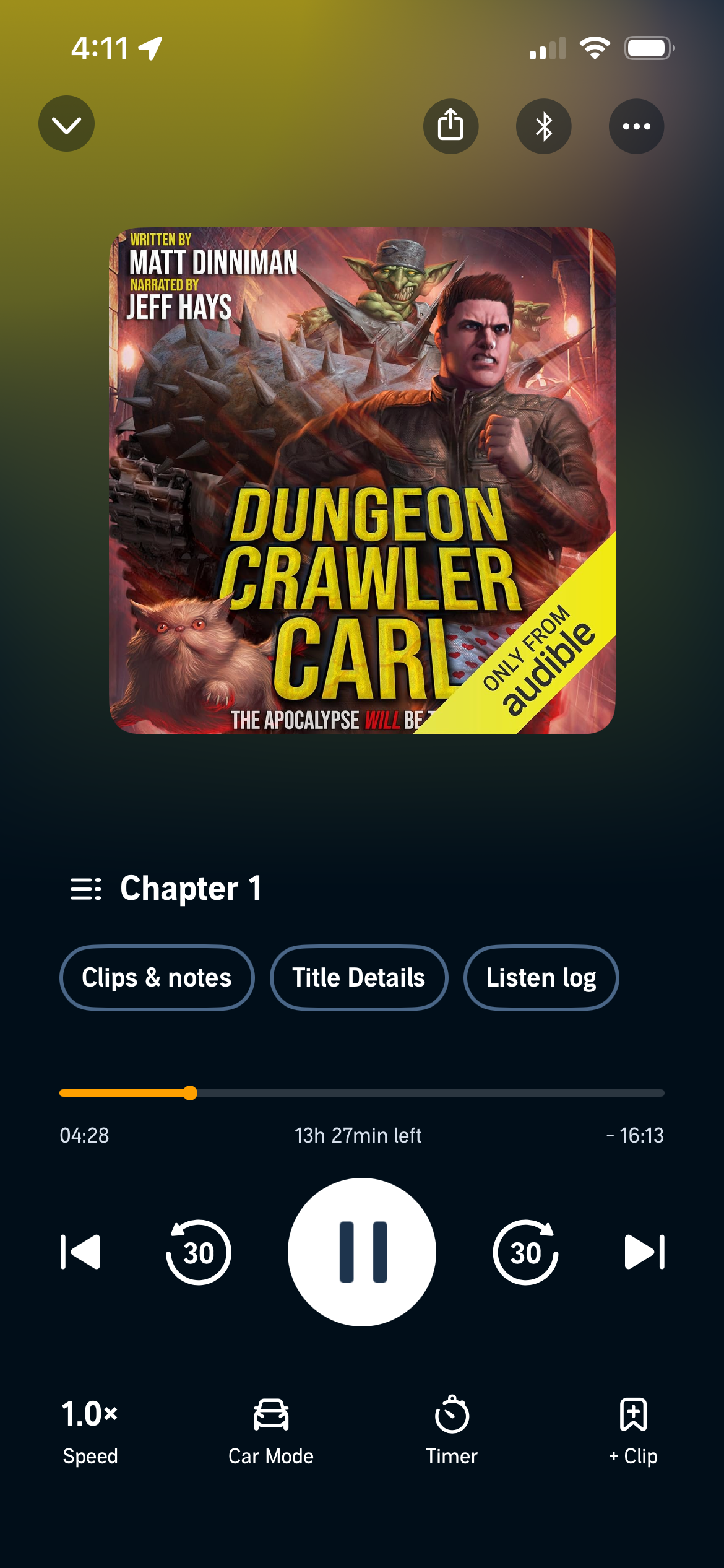 An audiobook titled Dungeon Crawler Carl by Matt Dinniman, narrated by Jeff Hays, is playing on Audible with controls and chapter details visible.