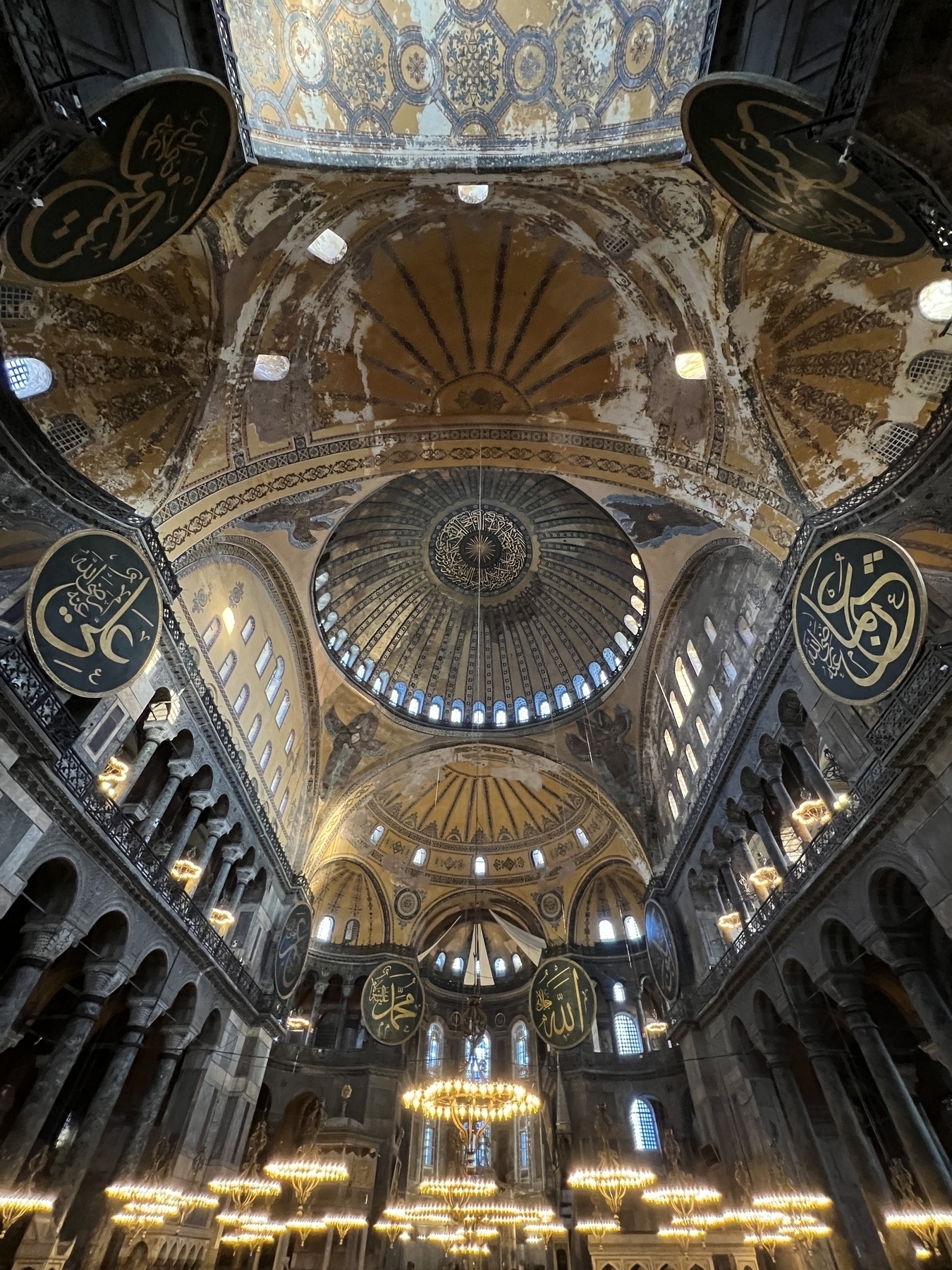 Wide angle showing the two half domes supporting the big dome of the ceiling of the Hagia Sophia