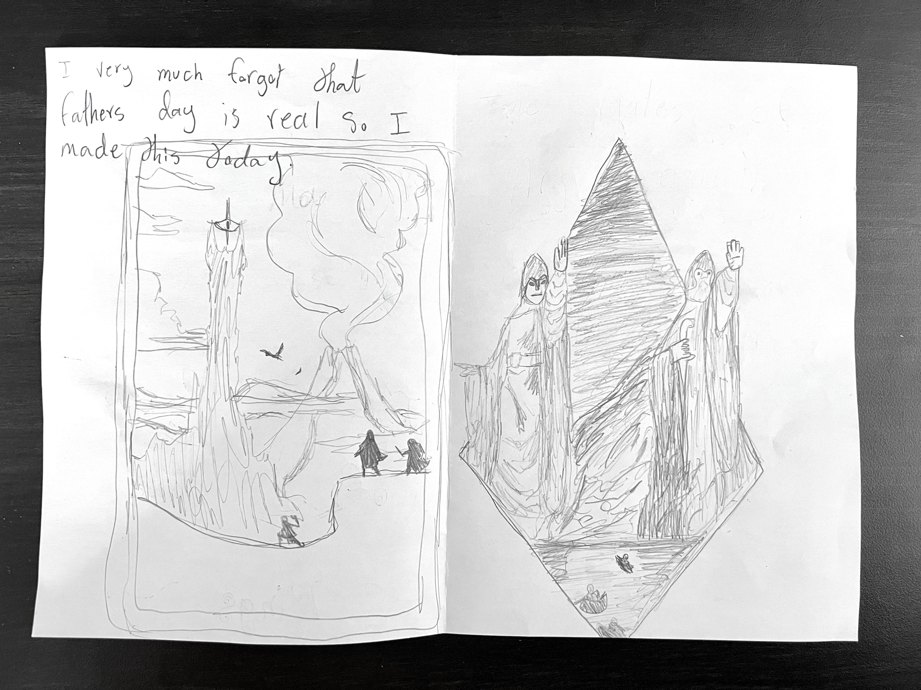 The inside of the card showing two scenes: a long shot of Sam and Frodo at Mordor with The Eye of Sauron and Mt Doom; and the boats coming up to &10;The Pillars of the Kings. Her commentary: “I very much forgot that Father’s Day is real so I made this today”