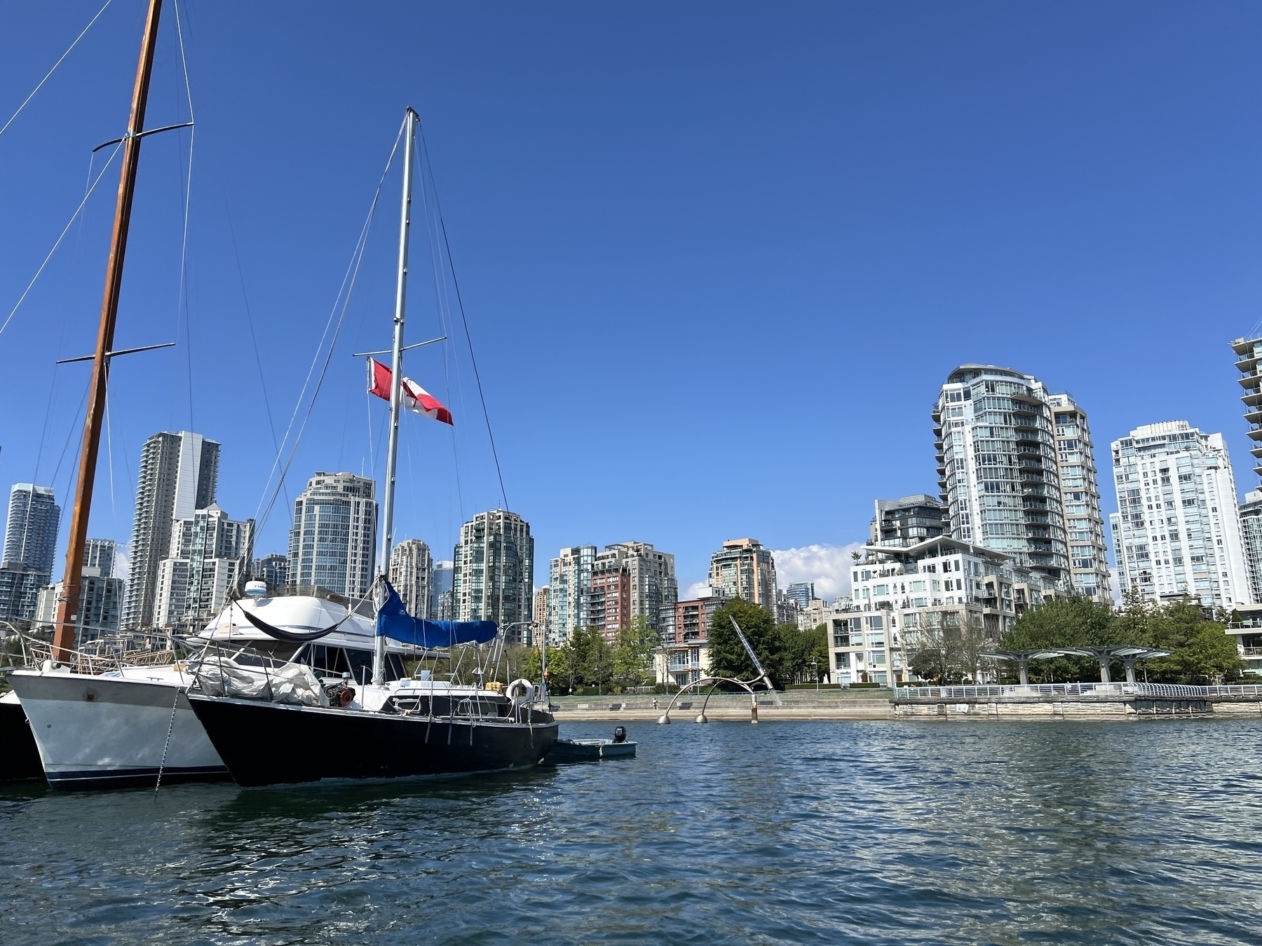 Sailboats at anchorage with Yaletown in background 