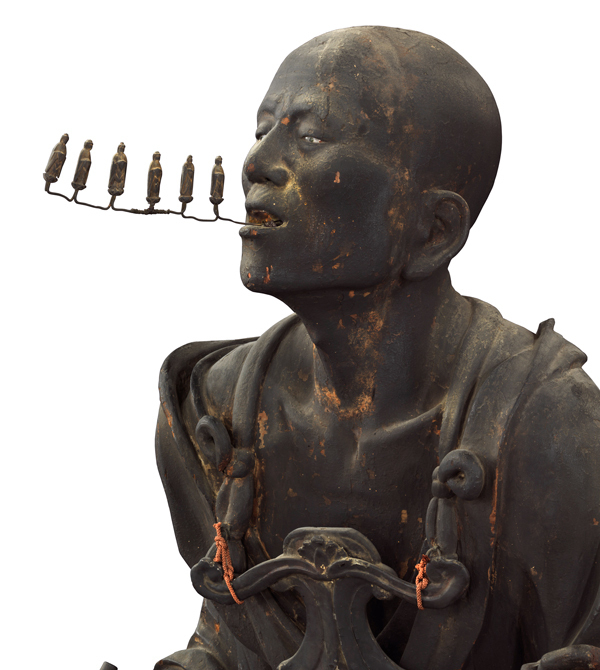 Close up of Kuya statue's head where you can clearly see the wire protruding from his mouth with 6 little Amida Bodhisatvas standing up