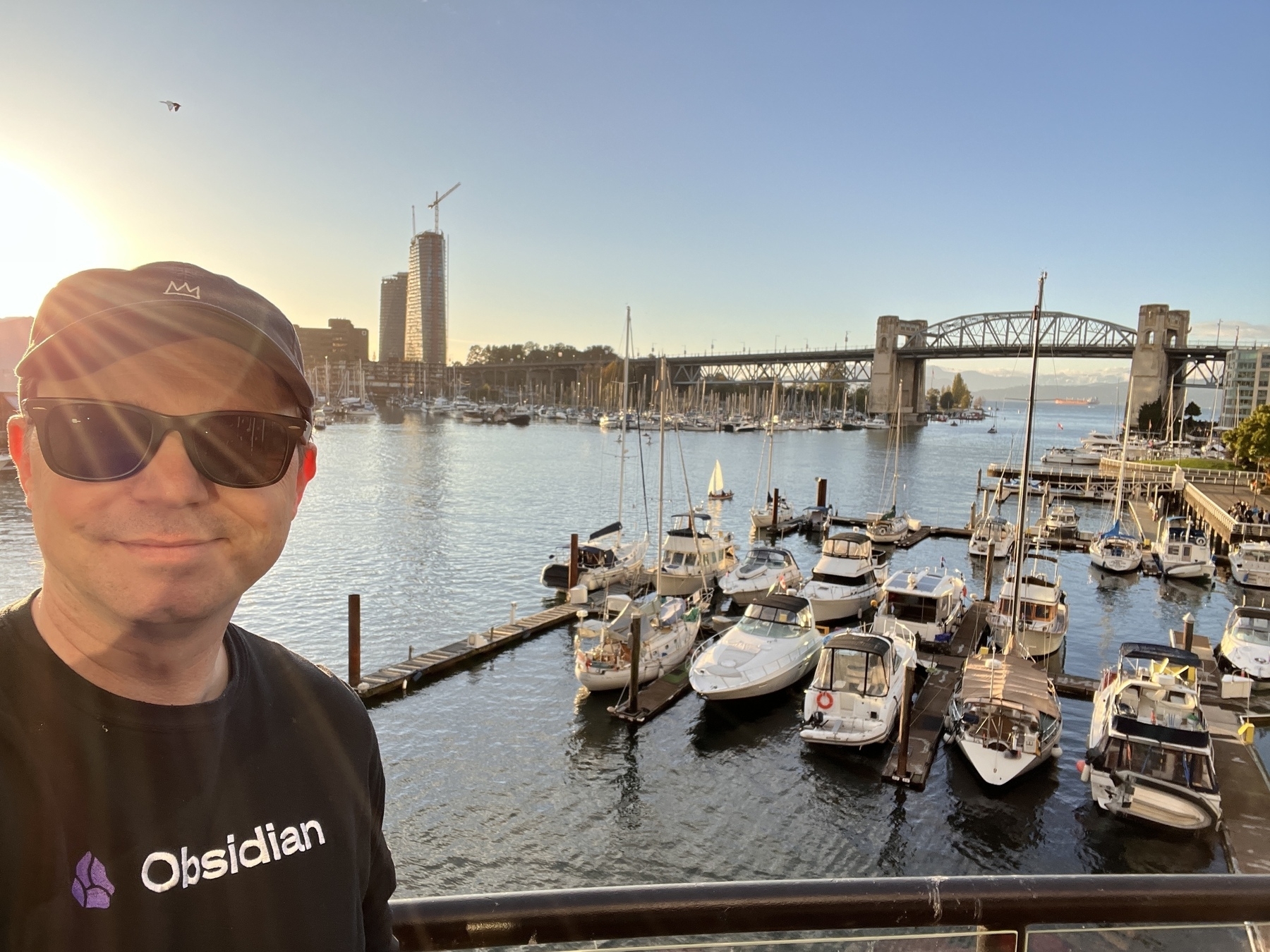 Chad selfie above the False Creek Yacht Club as the sun goes down