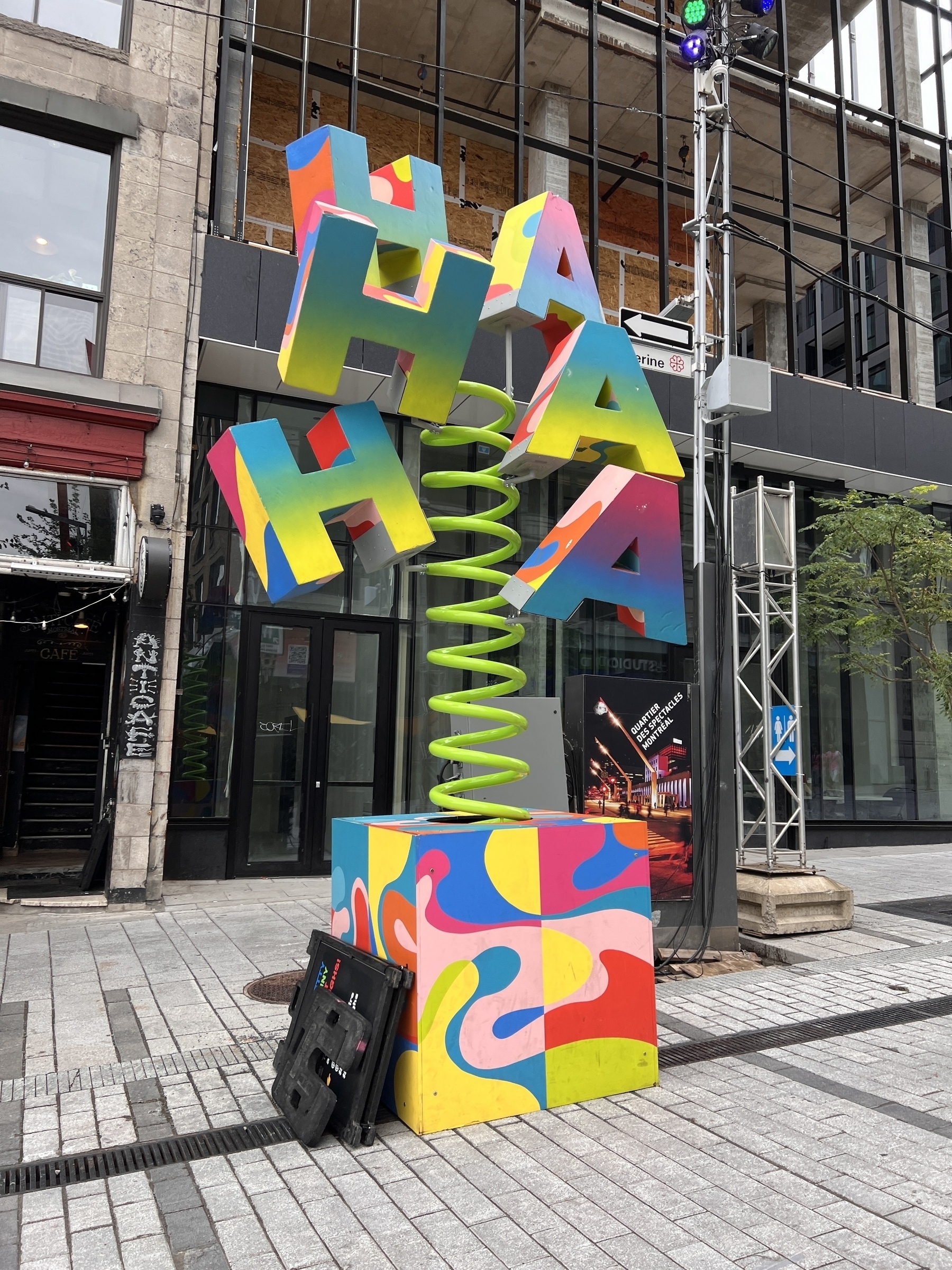 Not sure how to describe this… a bunch of giant colourful “HA”s attached to a big green spring like a jack-in-the-box. I assume it bounces around when pushed to give you that HA HA HA feeling 