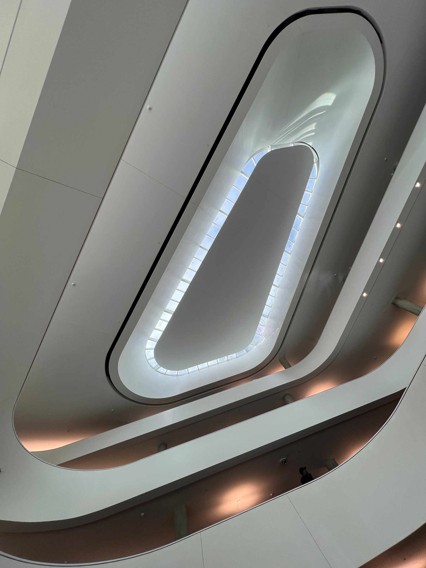 Inside the Surrey City library, a series of concentric rounded rectangles up to the skylight 