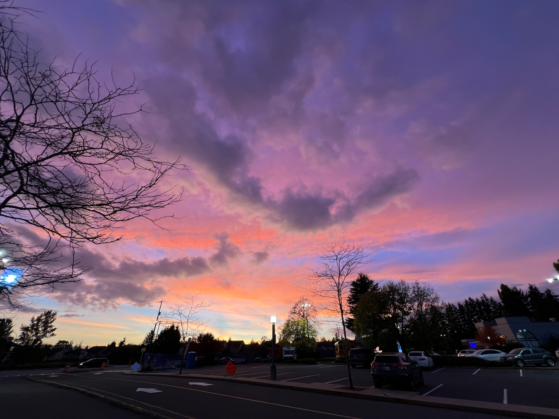 Sunset with the sky turning shades of orange, pink, and purple