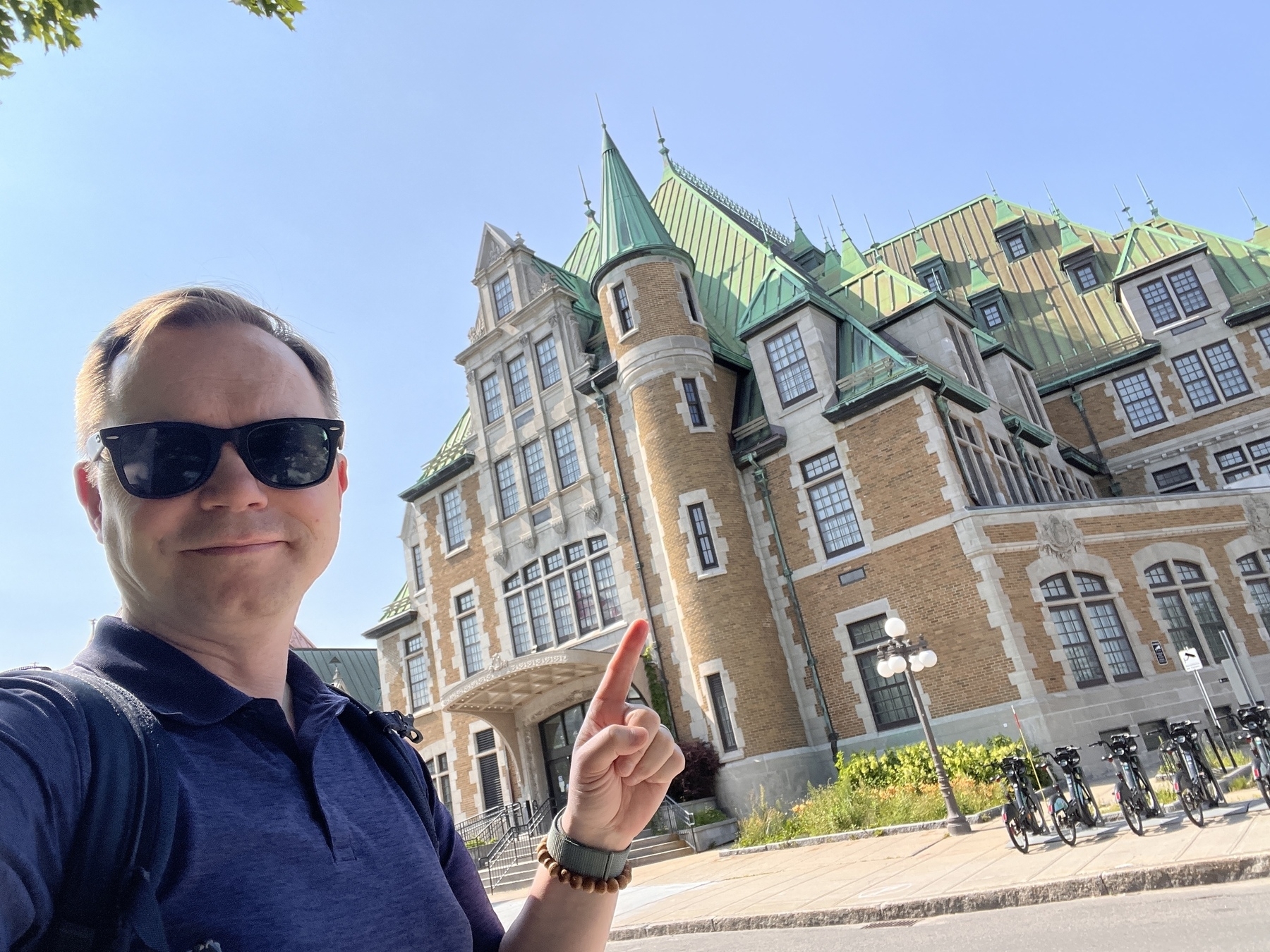 Chad selfie in front of a Canada government building right beside the station for no other reason than it looks like a castle