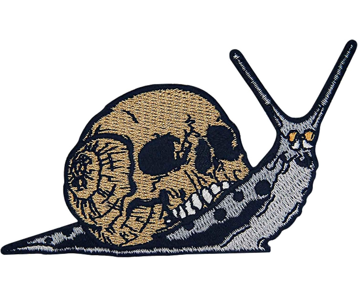 Embroidered patch of a snail with a skull for a shell