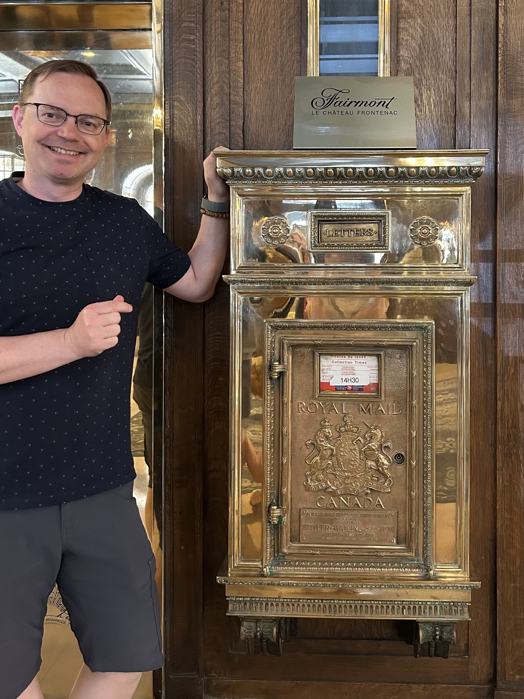 Chad in front of the Château Frontenac mail box