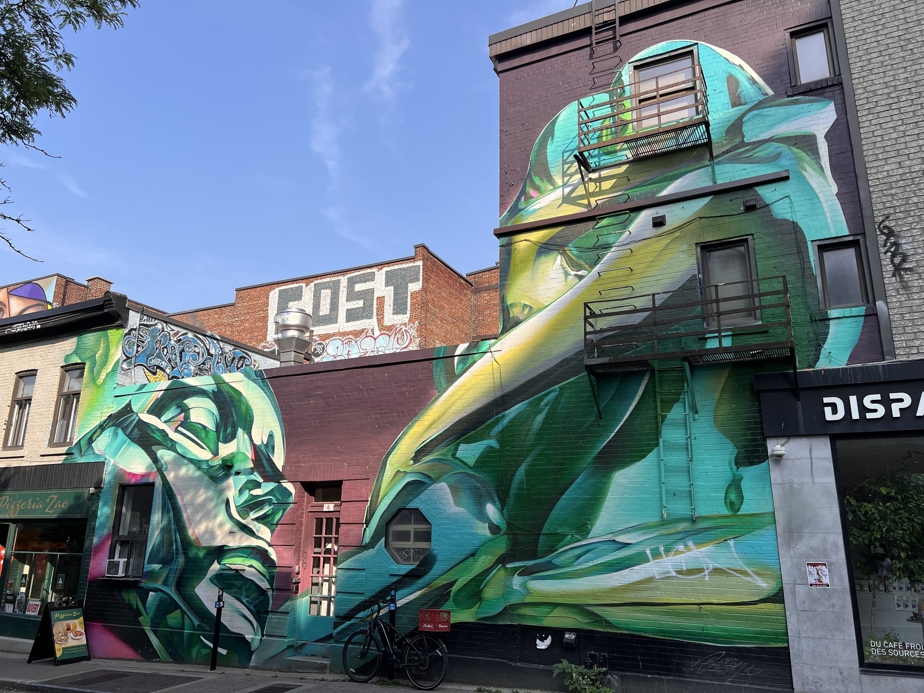 Mural of an emerald being