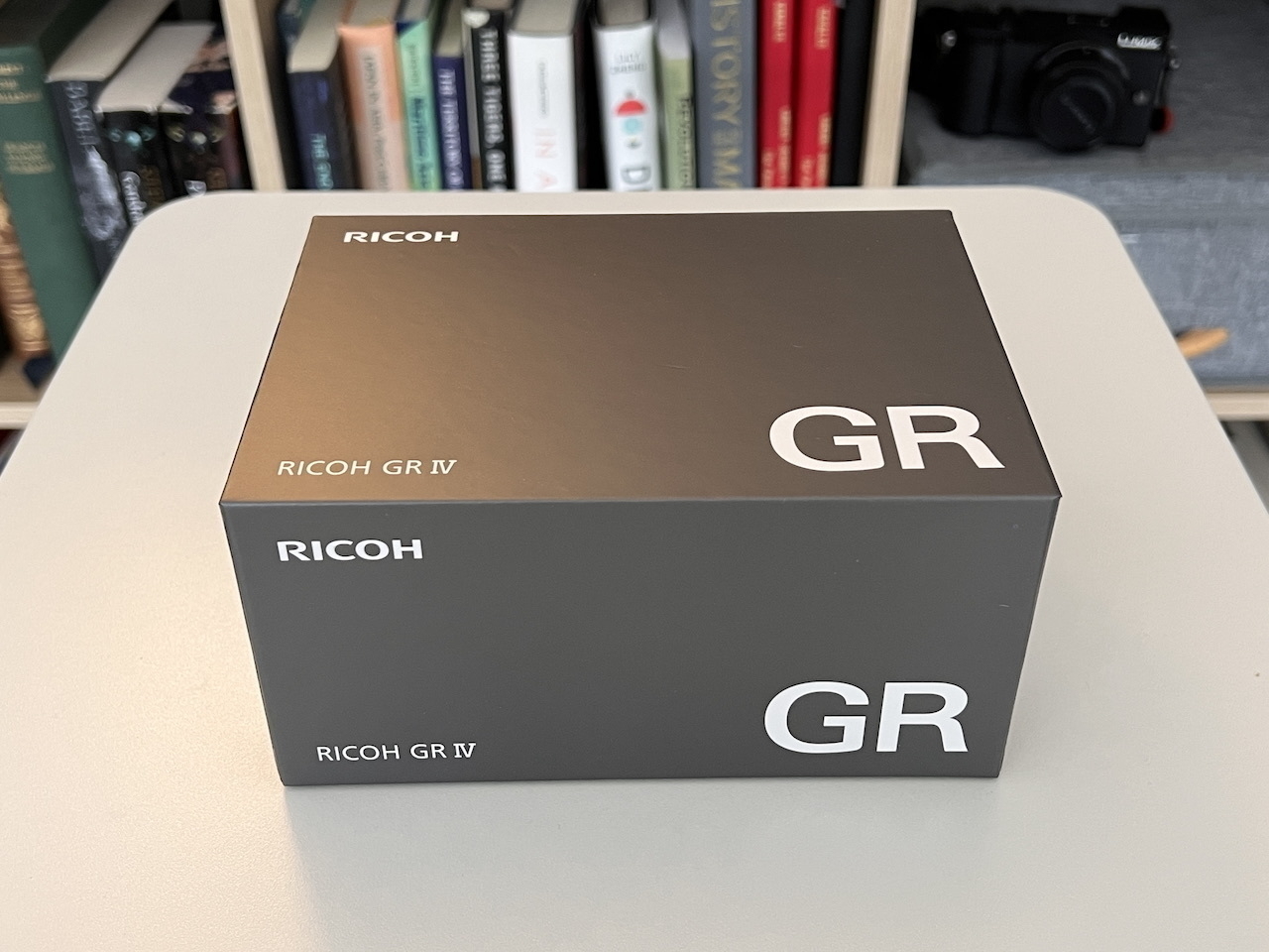 Unopened box for a Ricoh GRIV camera