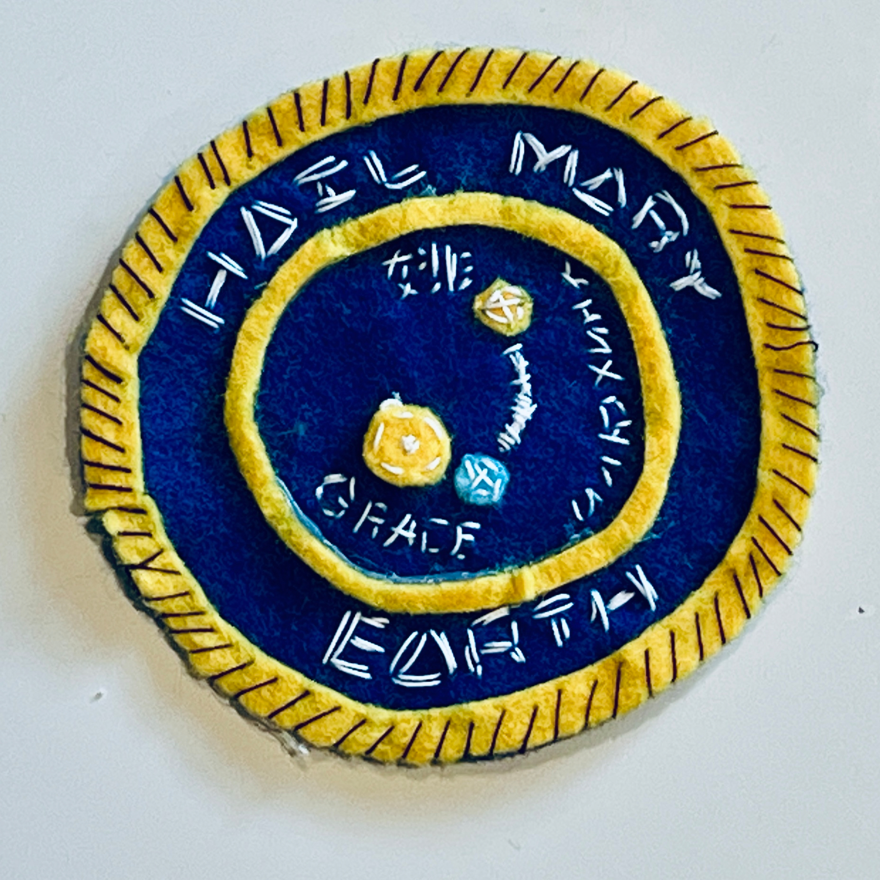 Hand sewn patch made from felt