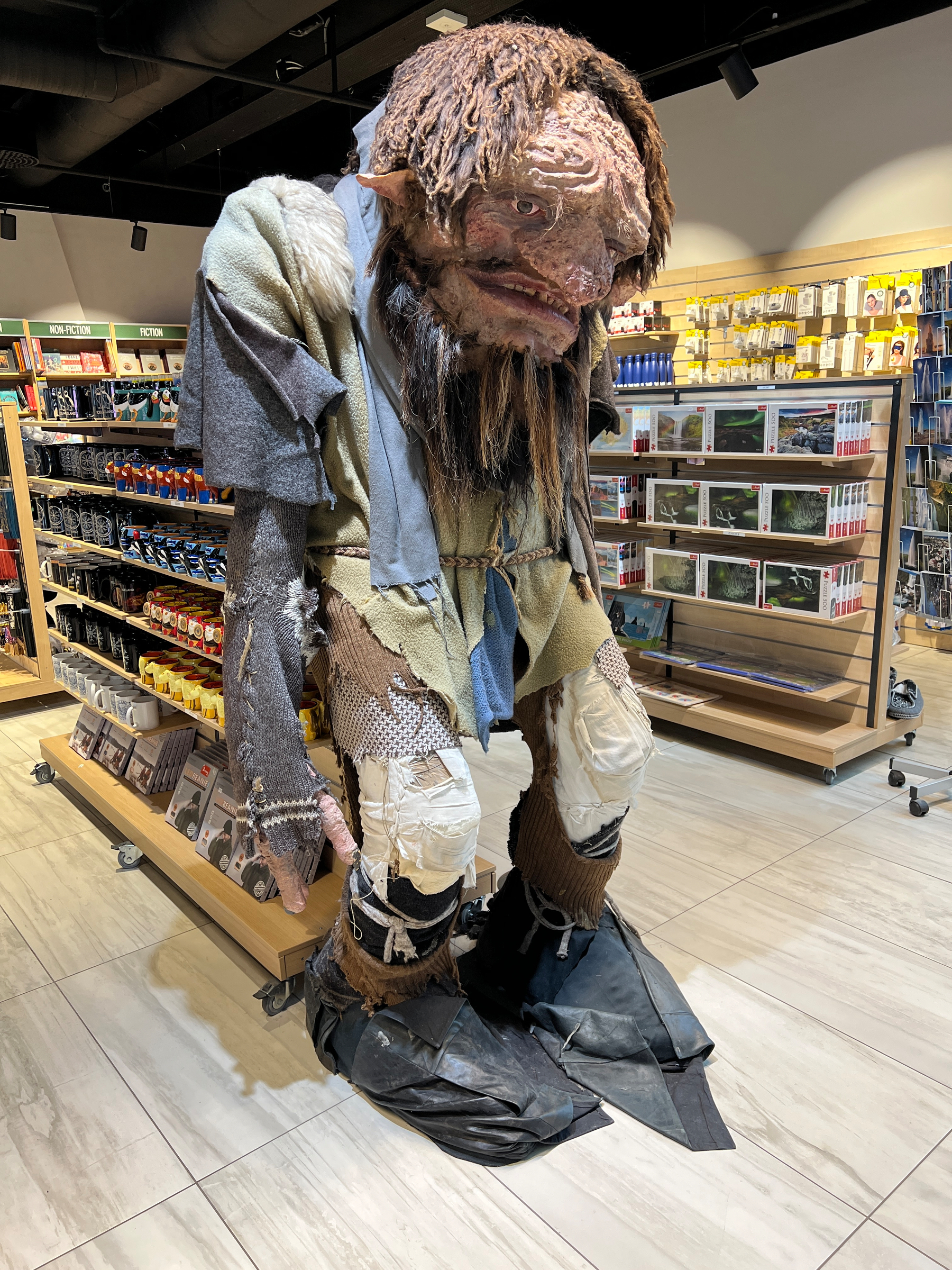 Some sort of giant troll statue made up of various materials