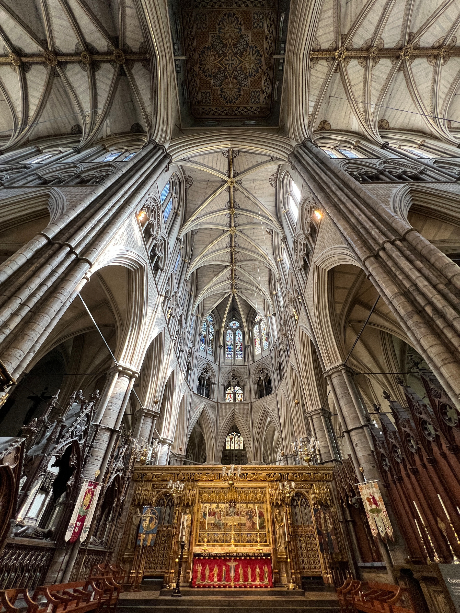 The main altar of Westminster Abbey in wide angle capturing the arched ceiling 