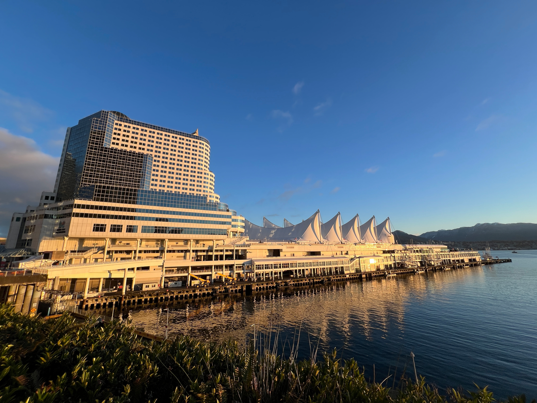 Canada place lit up by the morning sun