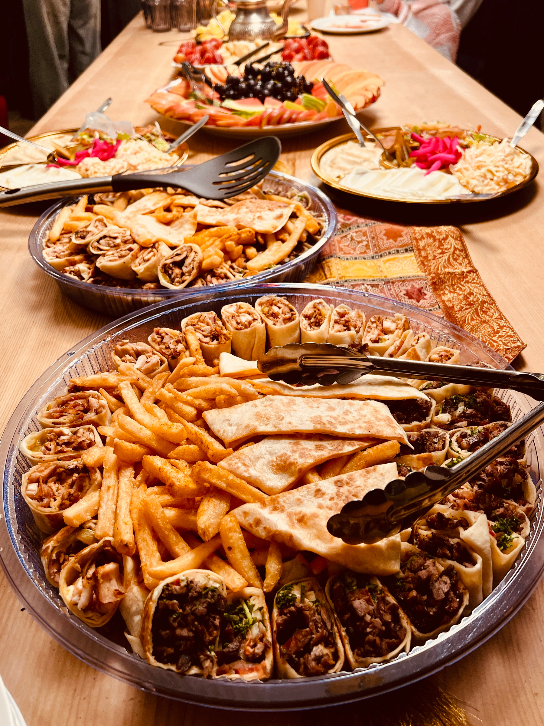 A table full of food platters