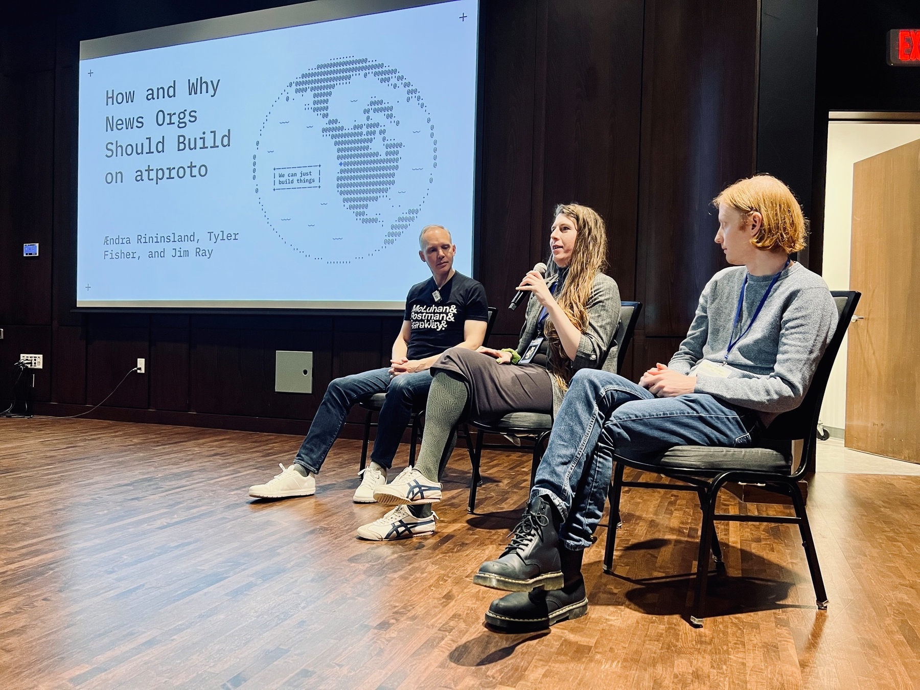 Jim Ray, Andra Rininsland, Tyler Fisher sit on a panel about how and why news orgs should build on atproto
