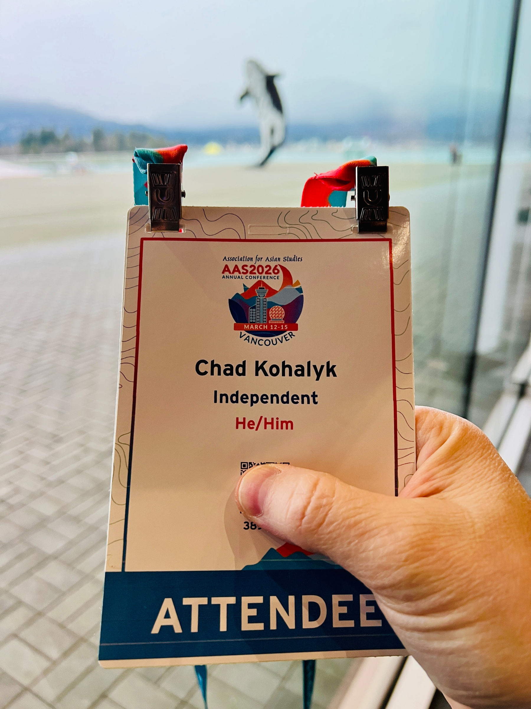 Chad’s AAS conference badge, with the Digital Orca in the background