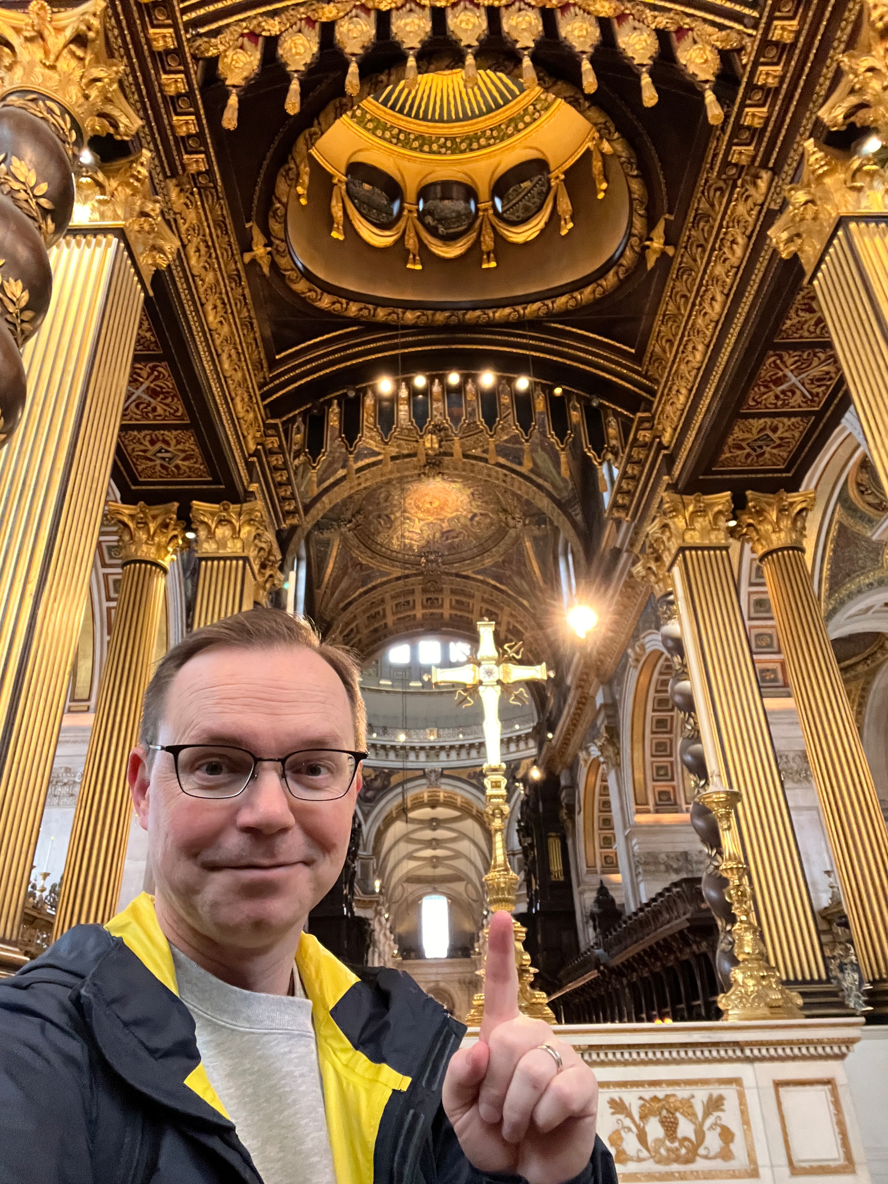 Chad at the back of the quire pointing to an impressive cross 