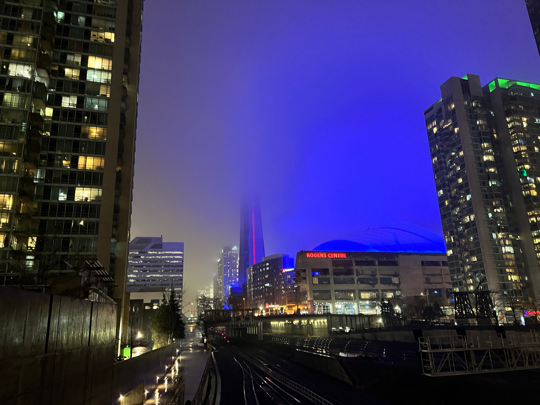 Rogers Center from the west at Spadina, the CN Tower completely engulfed in fog