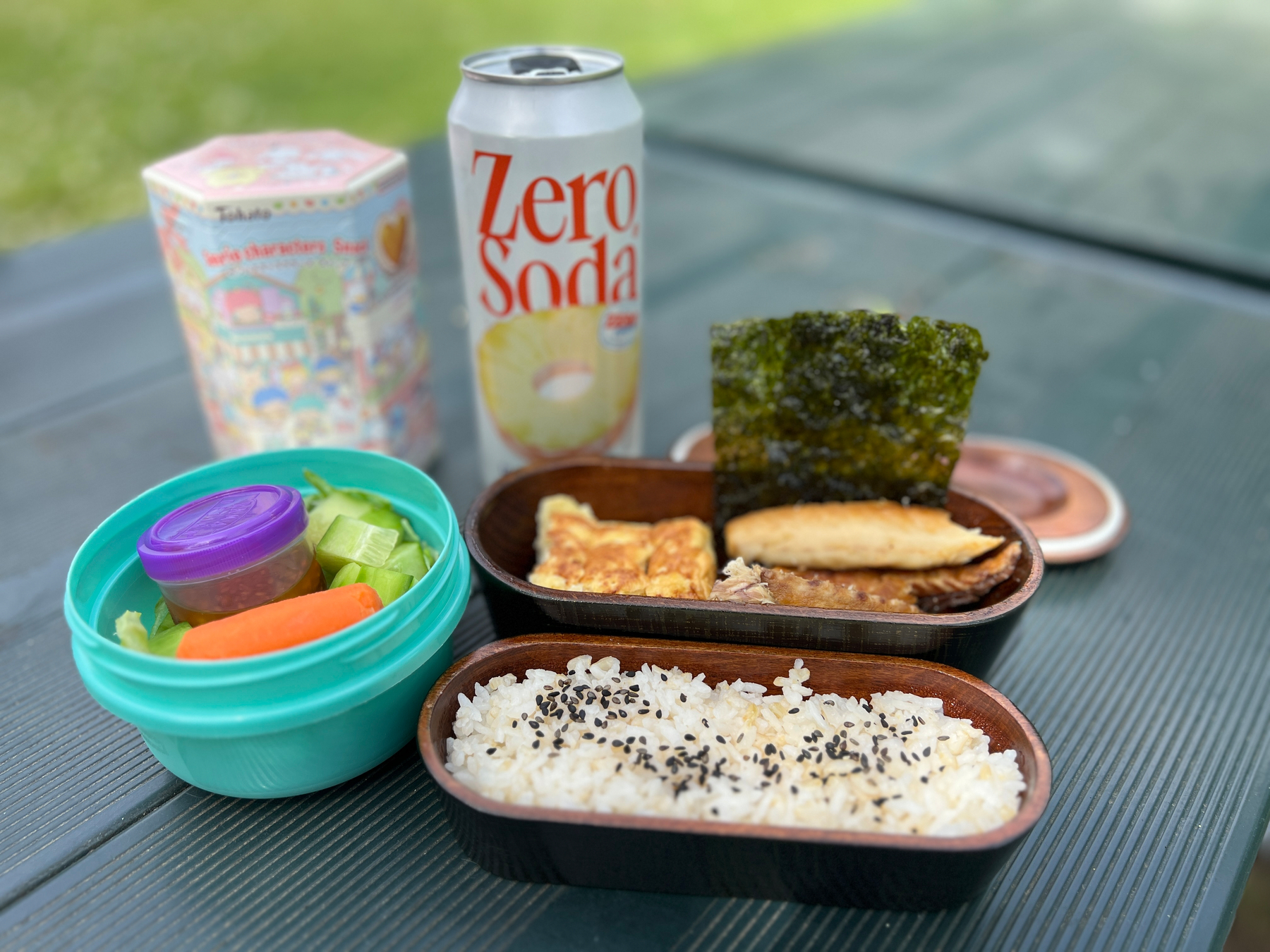 Bento box with a can of pineapple soda
