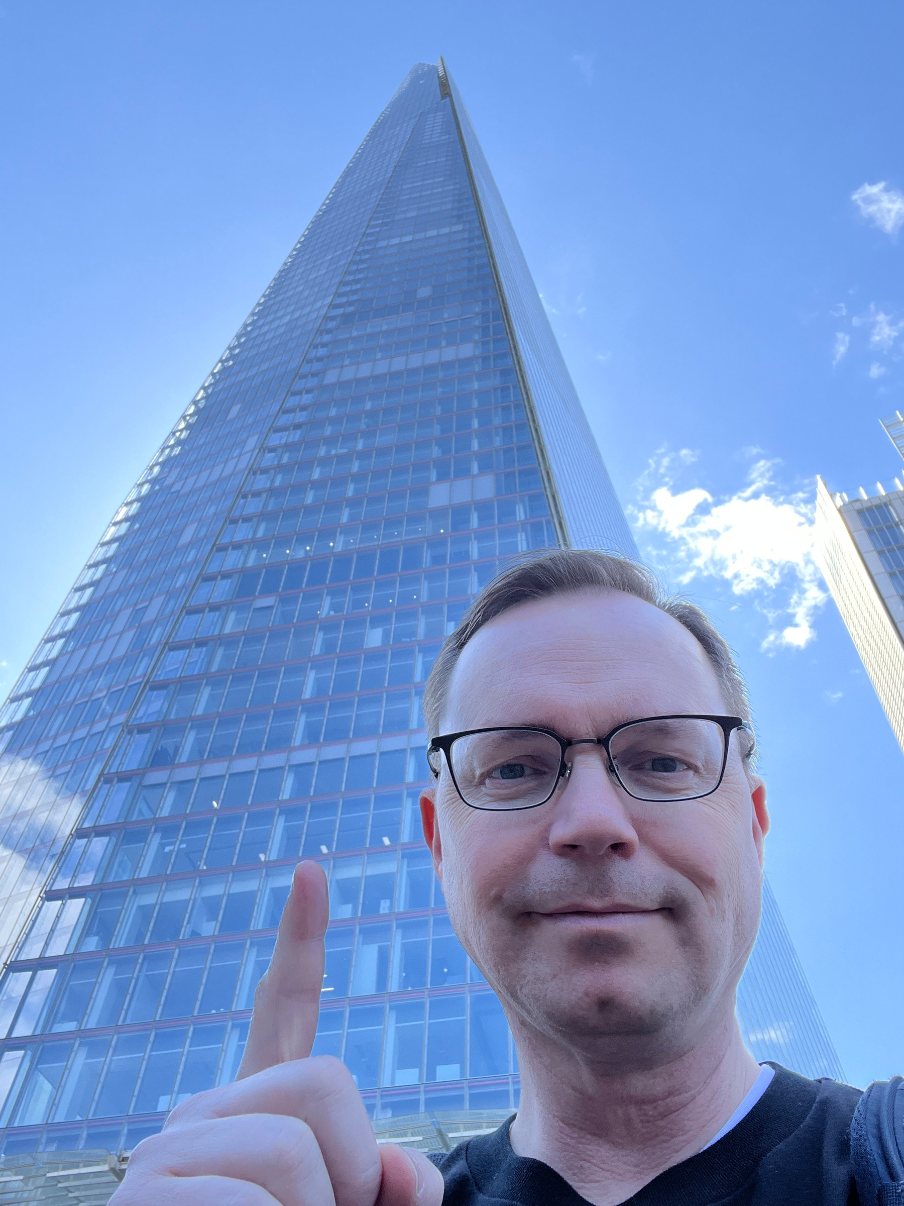 Chad selfie pointing up at The Shard