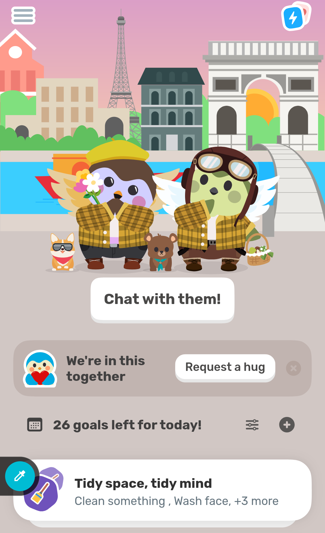 Screenshot of a mobile app featuring two cartoon bird characters in semi-matching outfits of yellow plaid tops, wings, pants with boots and hats in front of Paris landmarks. Buttons include 'Chat with them!', 'Request a hug,' and '26 goals left for today!' with a task prompt.