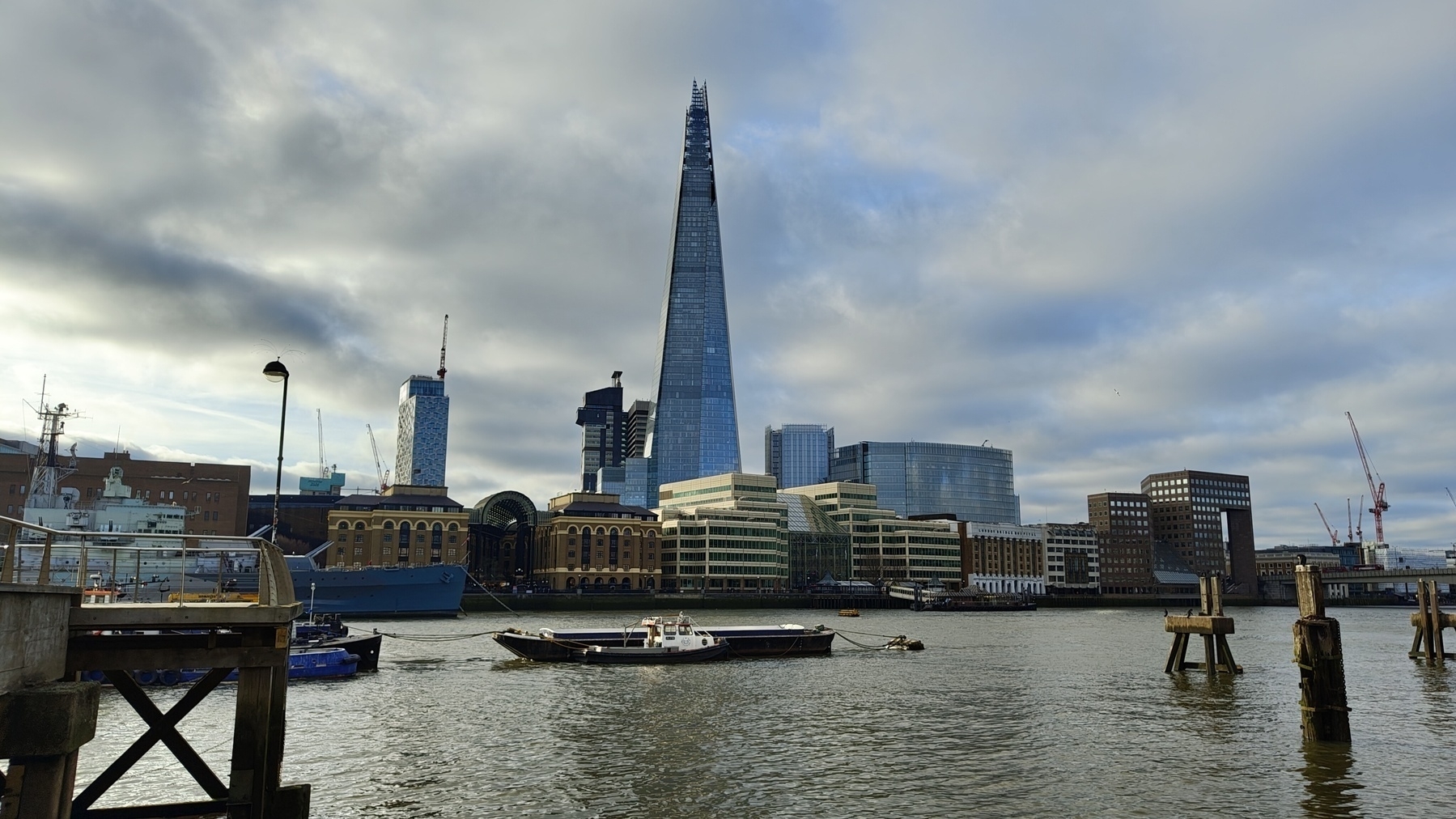 Looking across the Thames from Tower Hill towards the Shard skyscraper.