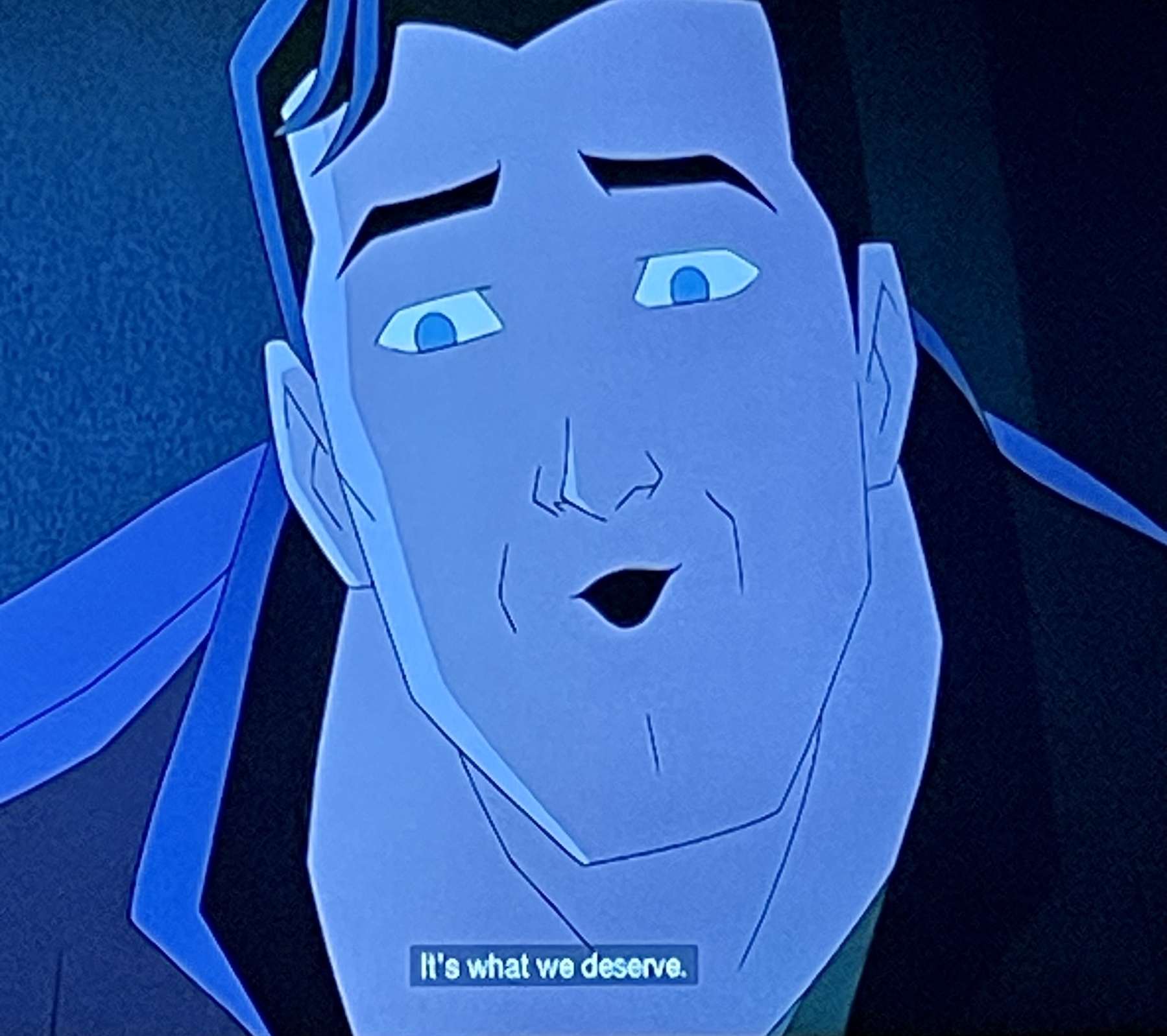 Close up of animated Bruce Wayne (after having just told his inner child “come on champ let’s go watch our parents die”) saying earnestly to little Bruce, “it’s what we deserve” 