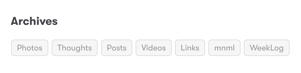Auto-generated description: A menu bar labeled Archives contains tags for Photos, Thoughts, Posts, Videos, Links, mnml, and WeekLog.