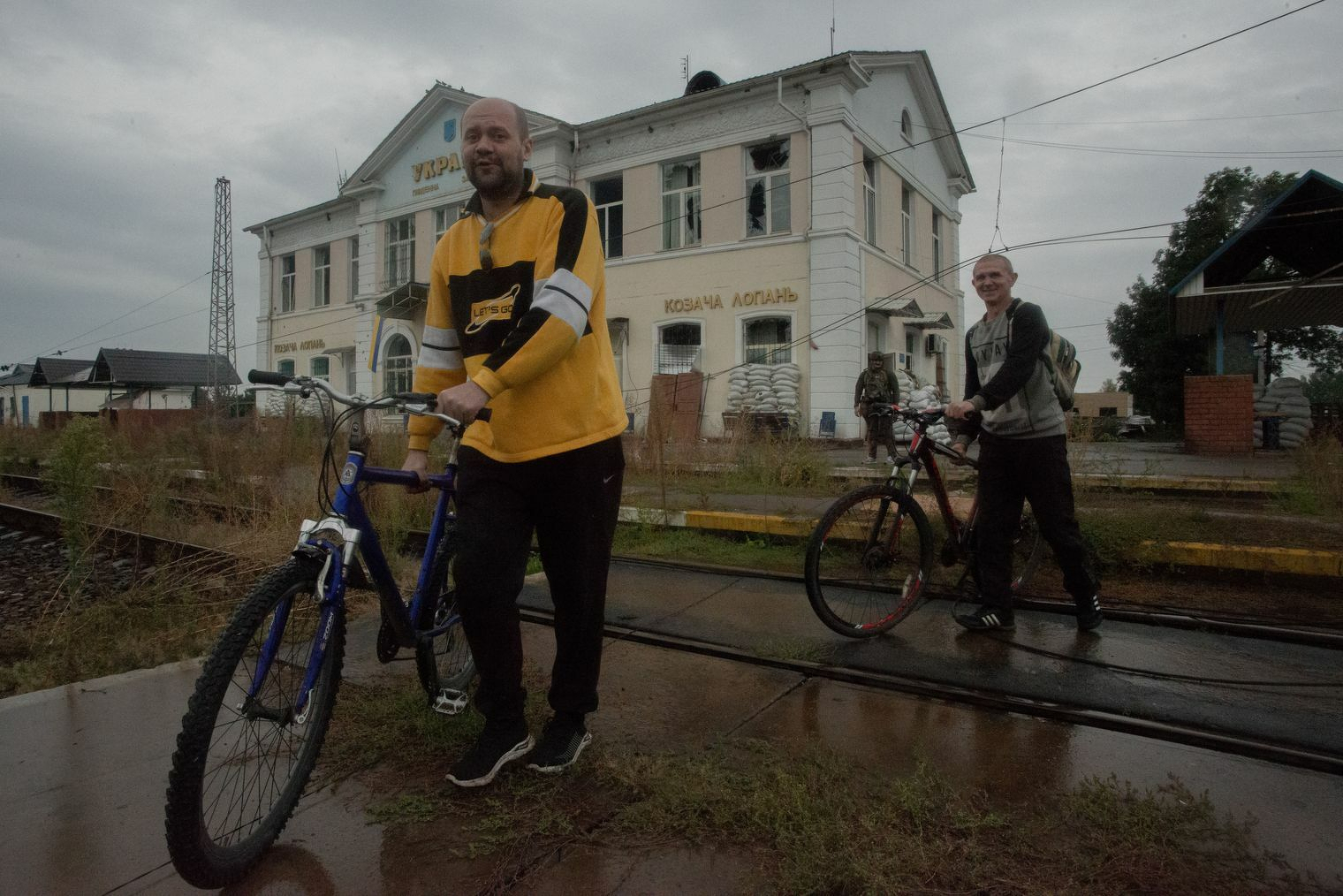 Locals at the railway station in Kozacha Lopan