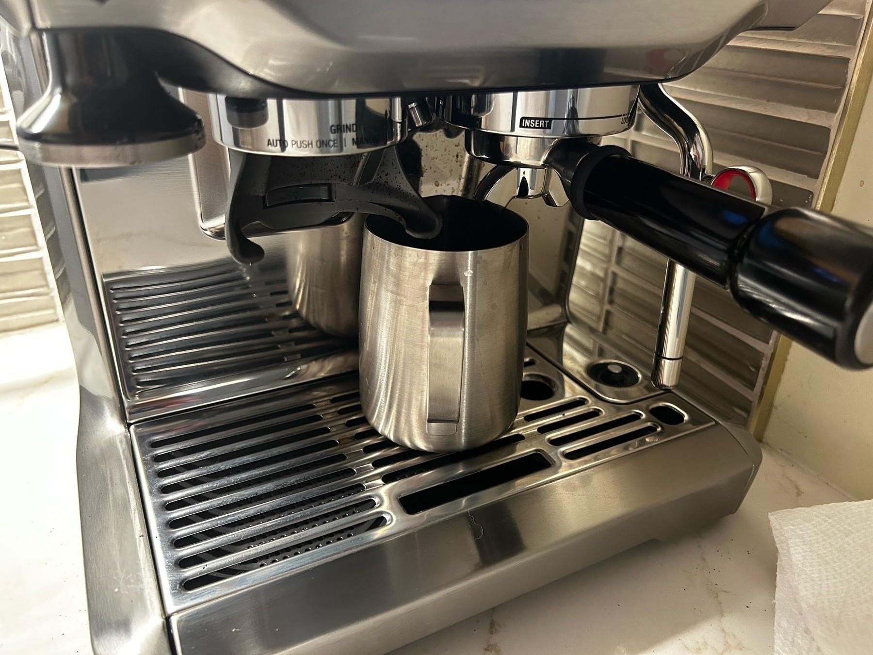 Closeup of an espresso machine. 