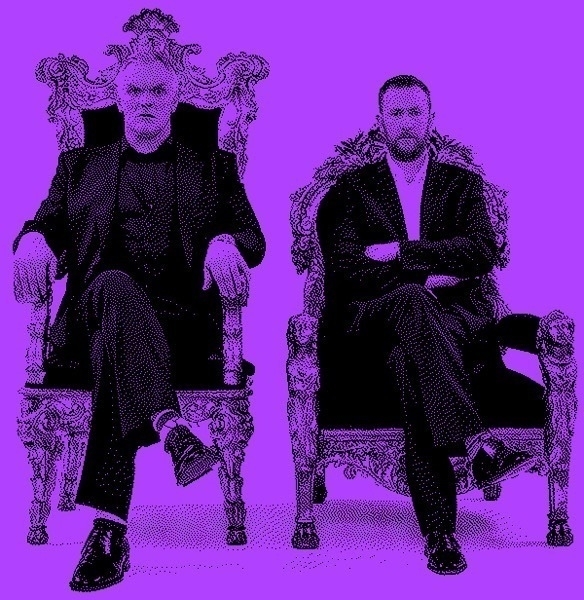 Grainy black and purple photo of Alex Horne and Greg Davis, the white male hosts of taskmaster, sitting in fancy chairs looking stern into camera.