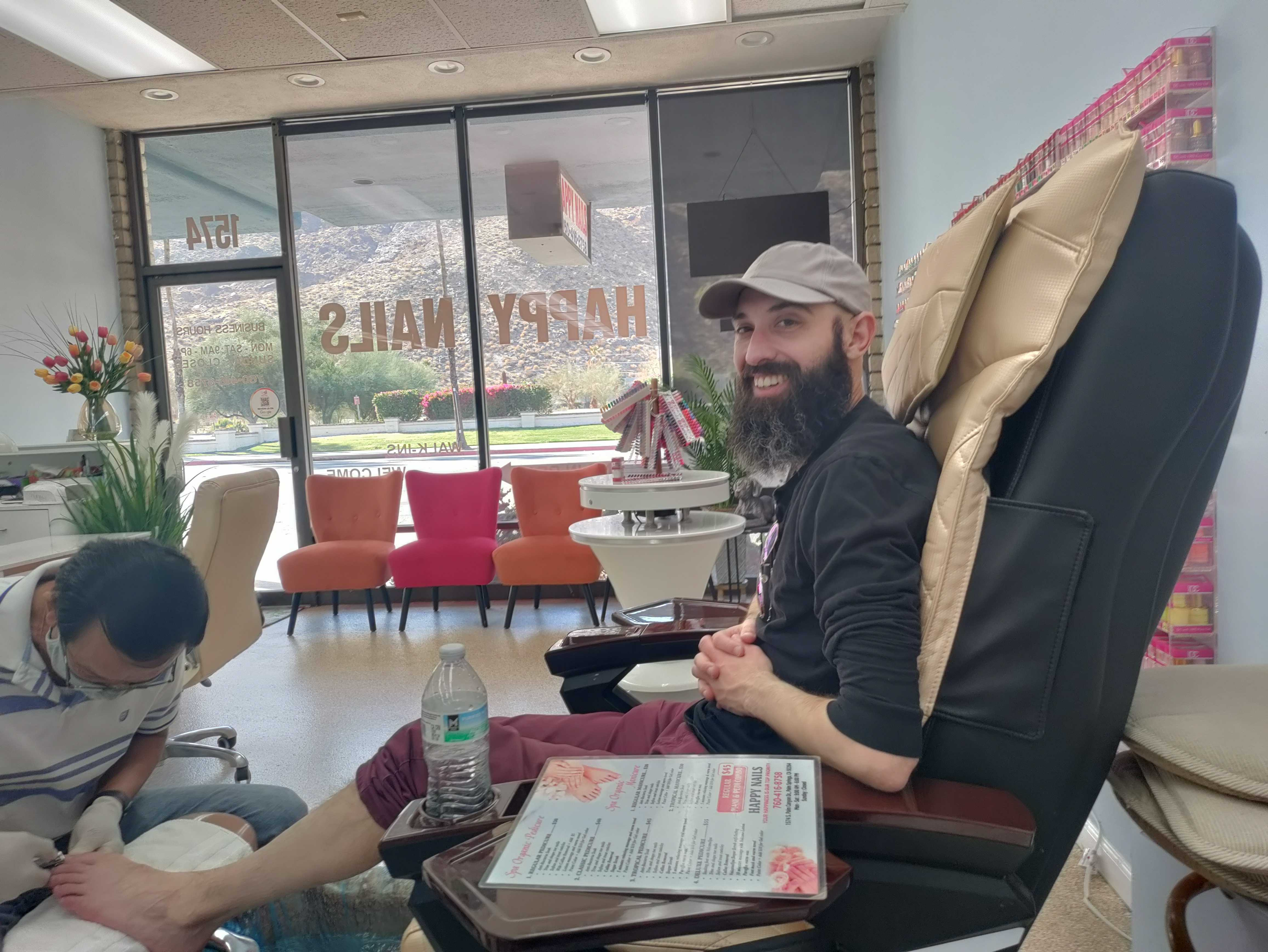 Me getting a pedicure. I’m smiling big. 