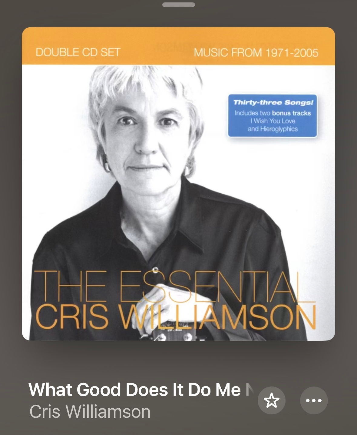 An album cover features a black and white portrait of Cris Williamson with text detailing The Essential Cris Williamson and additional album information.