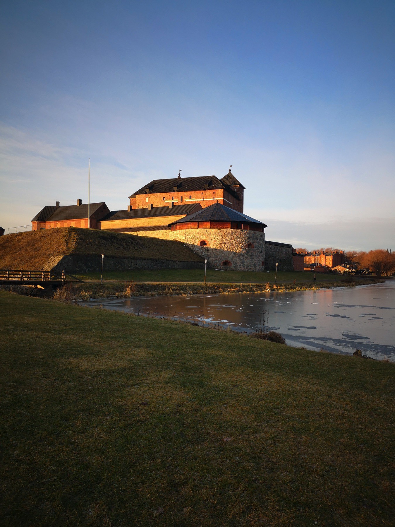 Häme castle lighted with rays of January sun