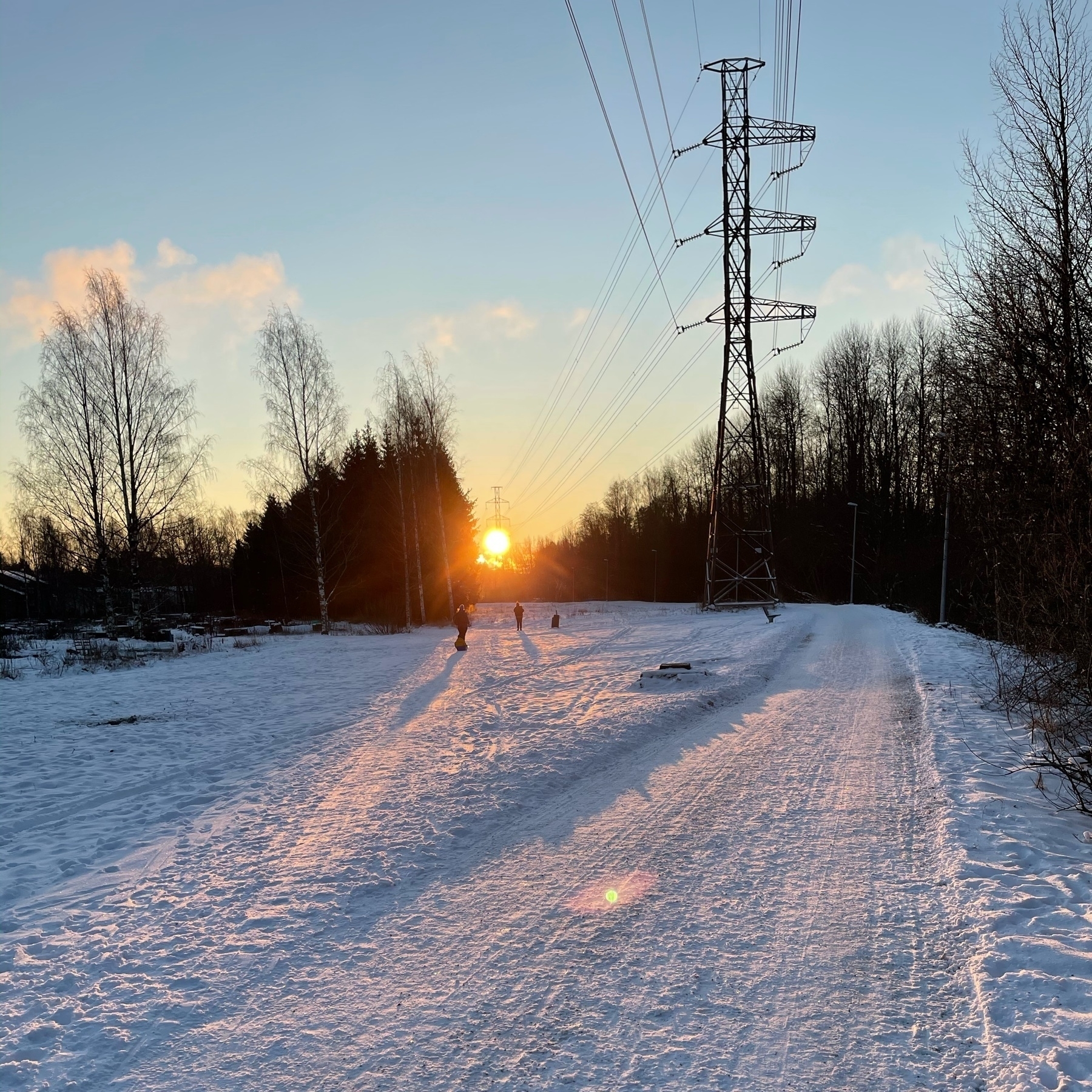 sun, snow, footprints on snow