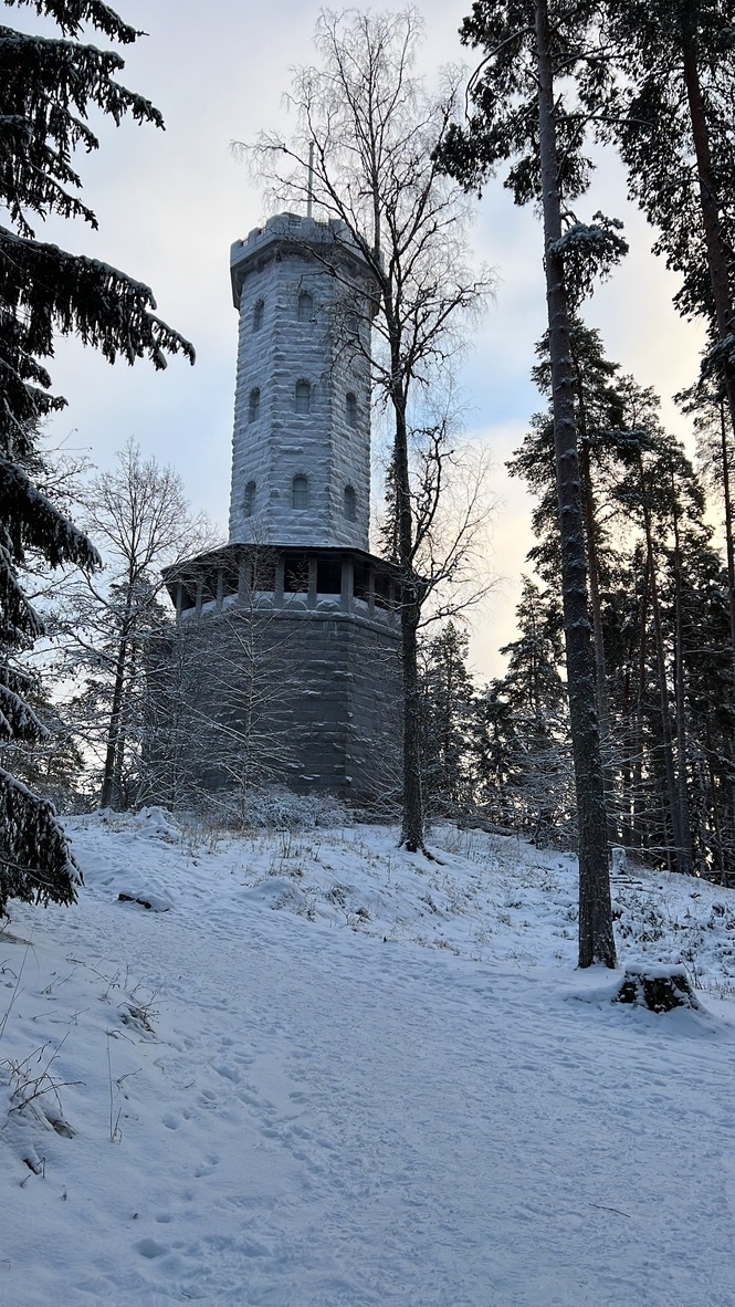 frozen stone tower on top of a hill