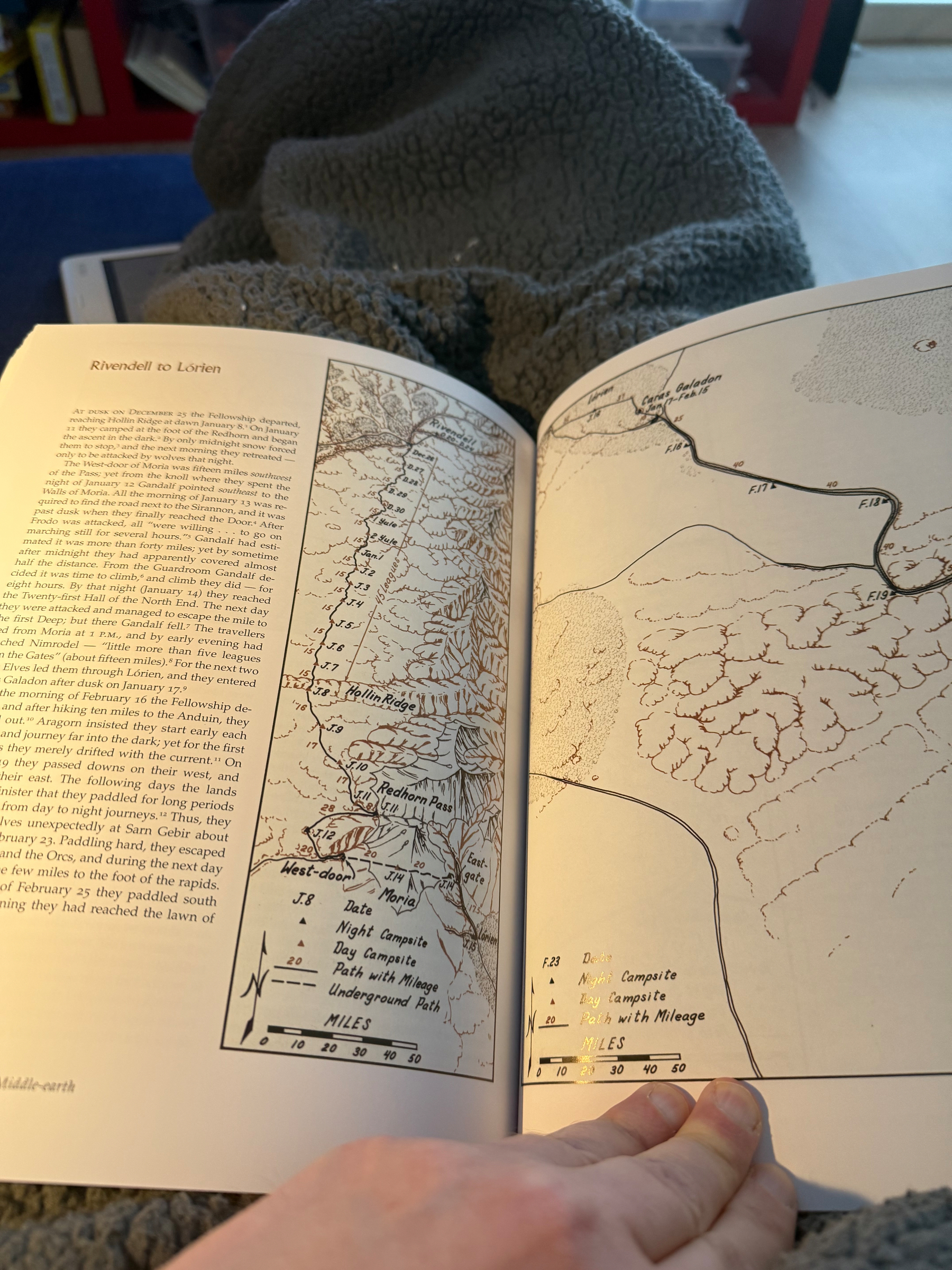 Page saying ”Rivendell to Lórien” from the Atlas of the Middle-Earth