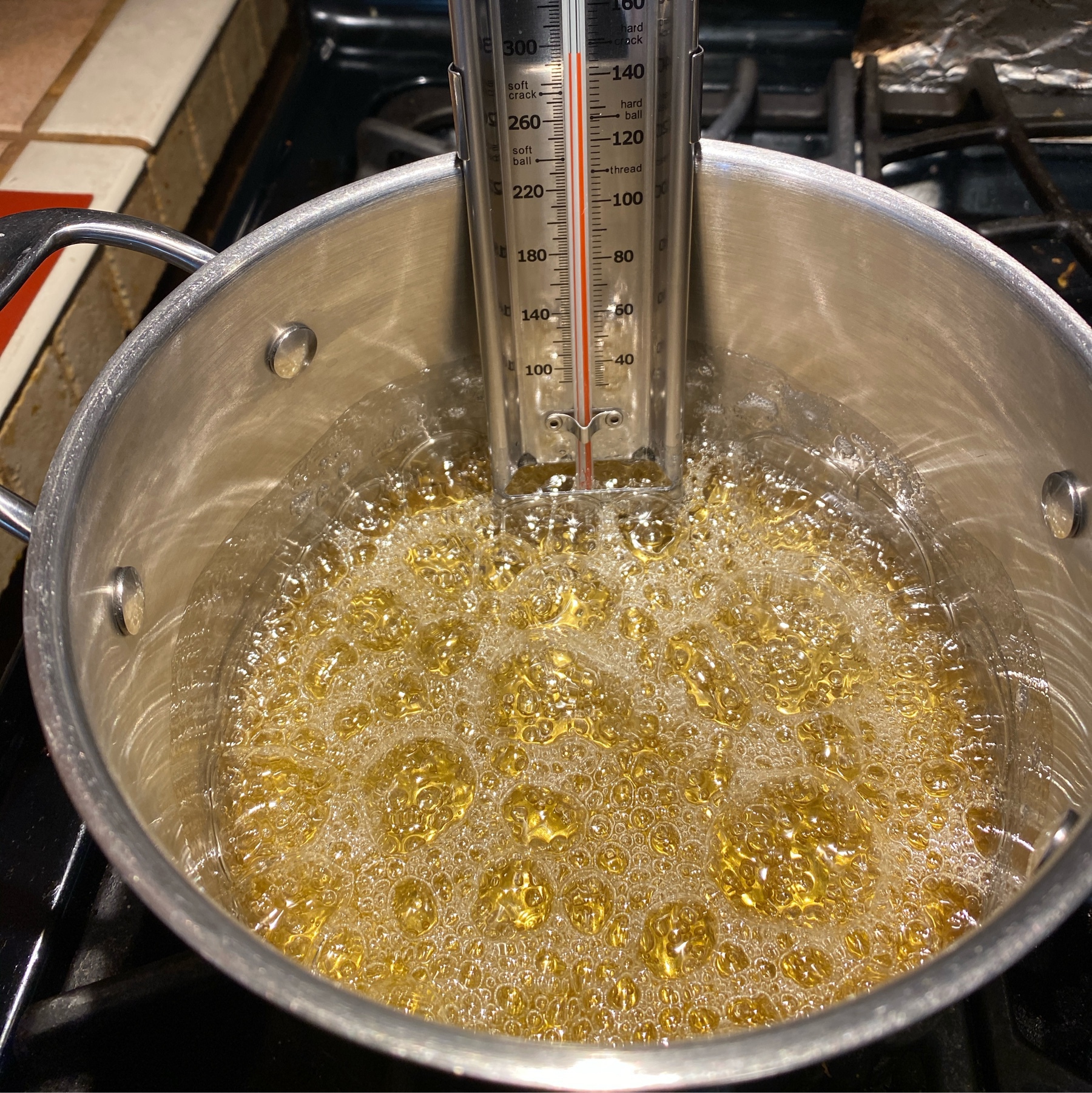 boling sugar mixture a gold color, almost 300F