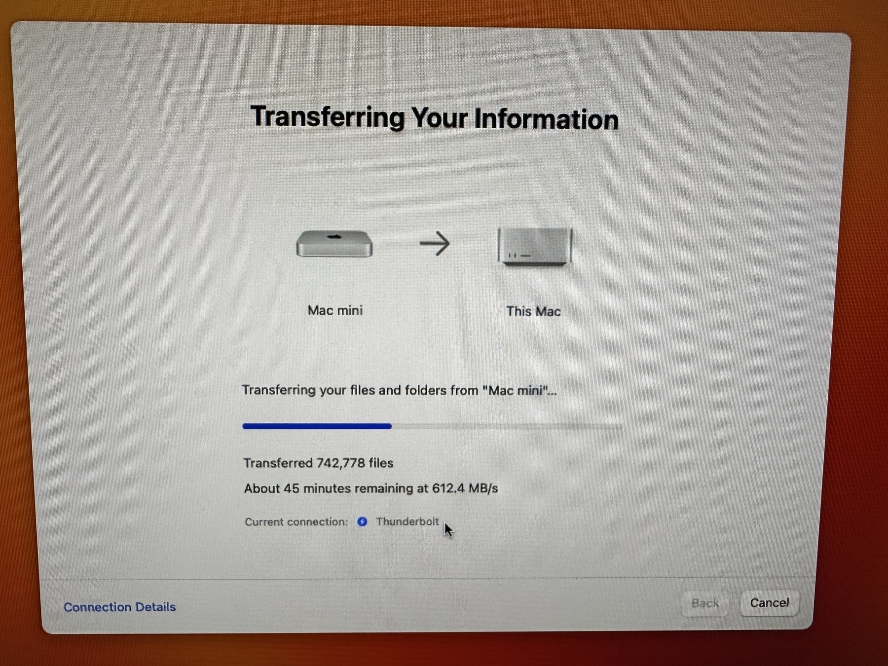 Migration Assistant dialog showing 612 MB/s transfer speed.