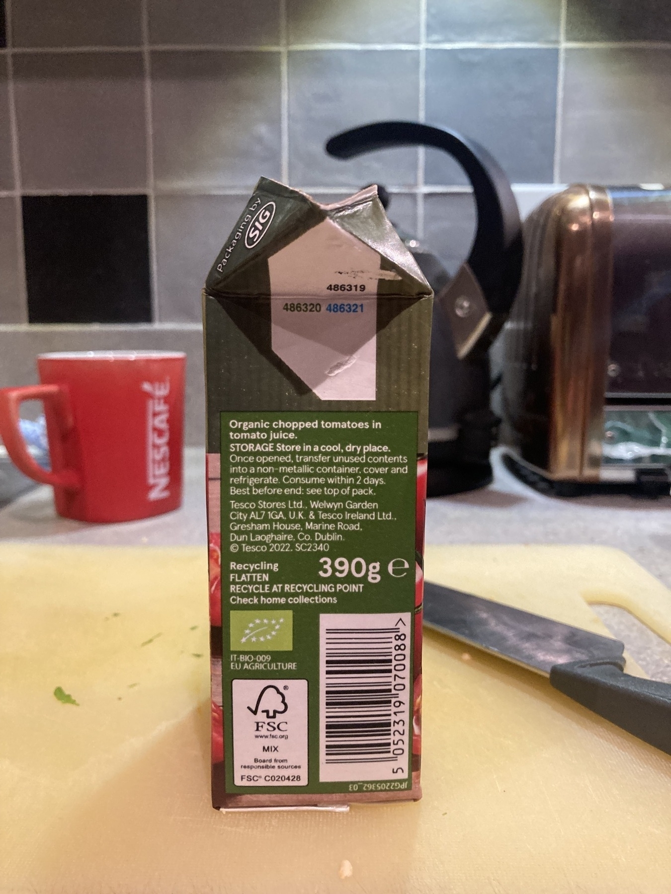 A close up of the label on a carton of Tesco's organic tomato slurry