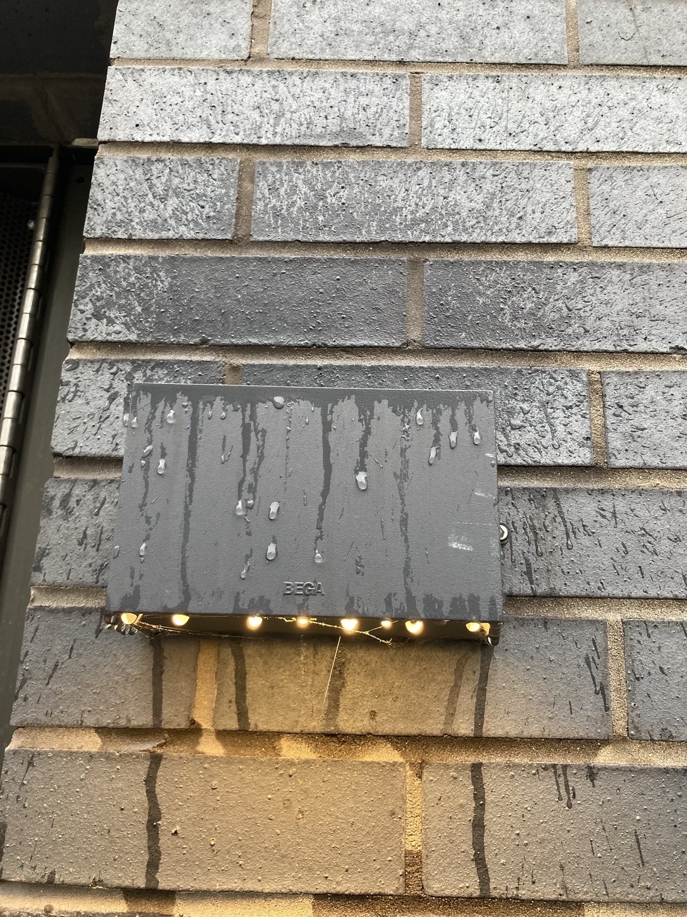 Rain bouncing off an exterior luminary