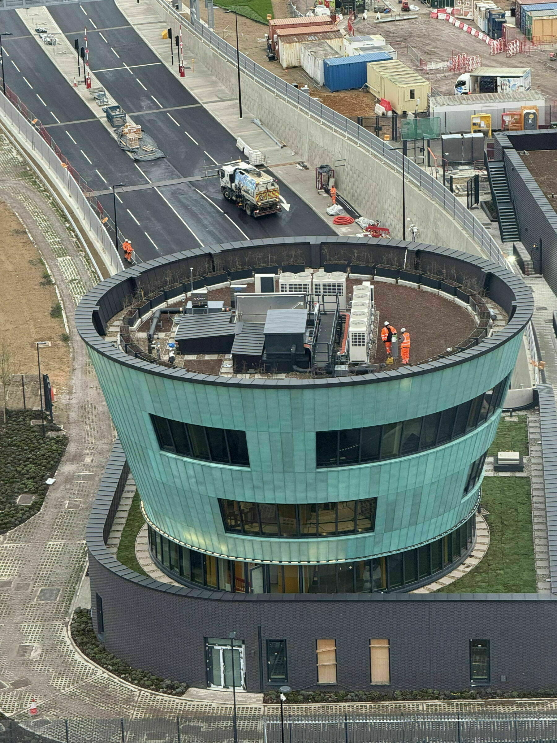 The green, anthropomorphic drum of the operations building for the new Silvertown Tunnel is nearing completion.