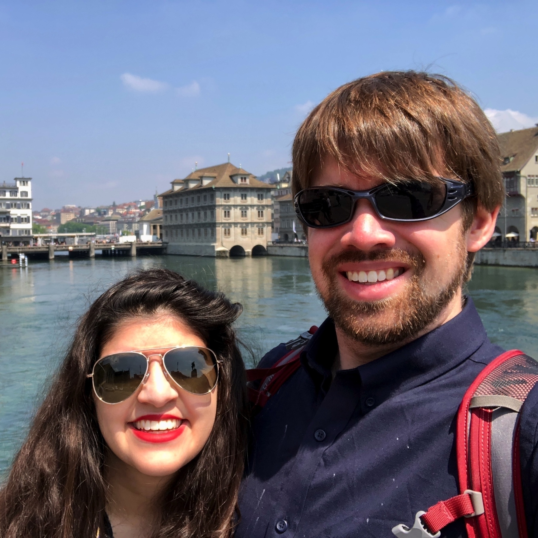 Photo of Meera and me on the Limmat with the Zurich Rathaus in the background.