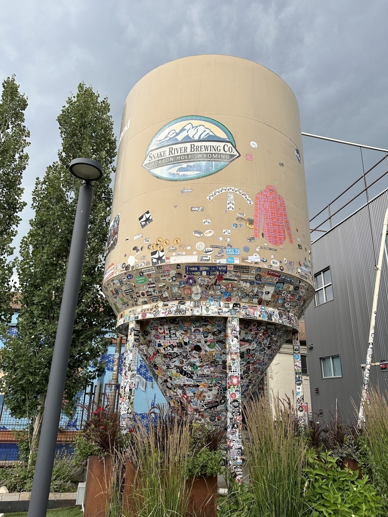 Old Snake River Brewing vat covered in stickers.