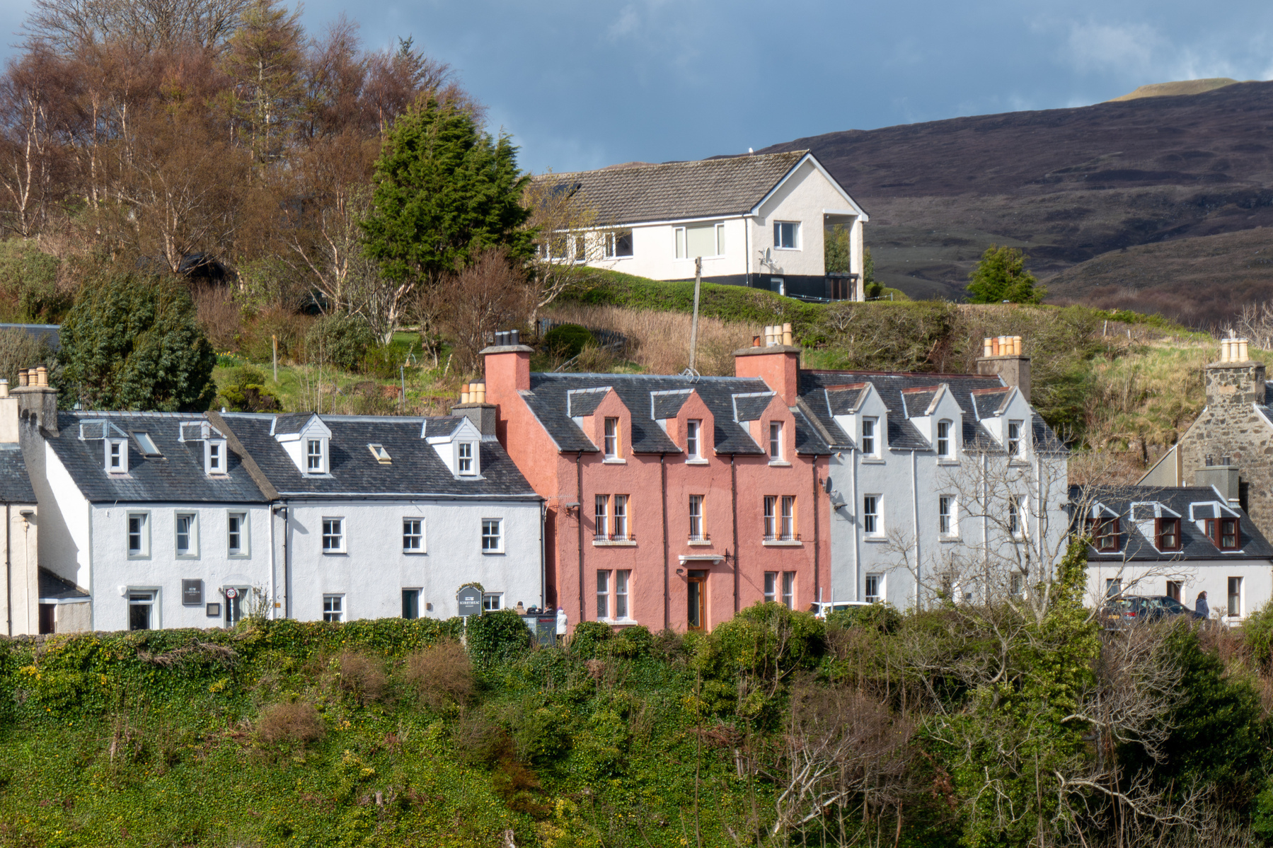 A row of coloured terrace houses.