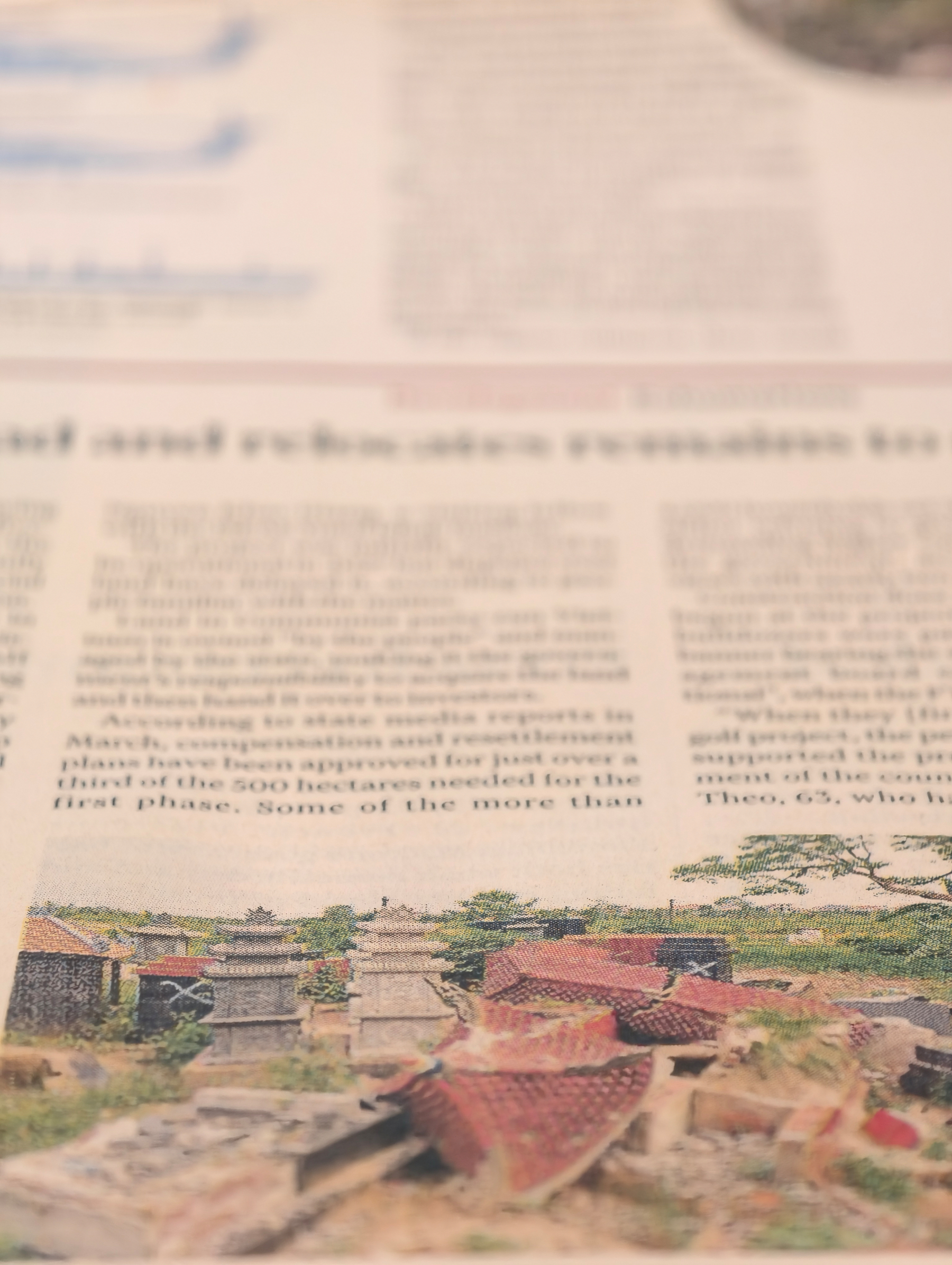Photo from a FT.com article "Vietnam digs up its dead and relocate remains to clear site for Trump golf course". That's a revealing piece, with a snapshot of graves marked for demolition 