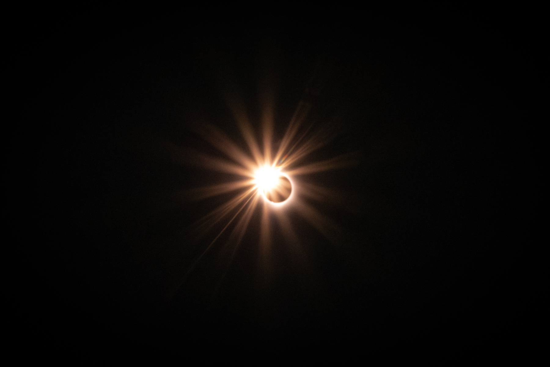 The stage of the eclipse known as the "diamond ring" 3 to 4 seconds before totality. This is where the sun is almost completely occluded by the moon, with a brilliantly bright "diamond" at one edge. 